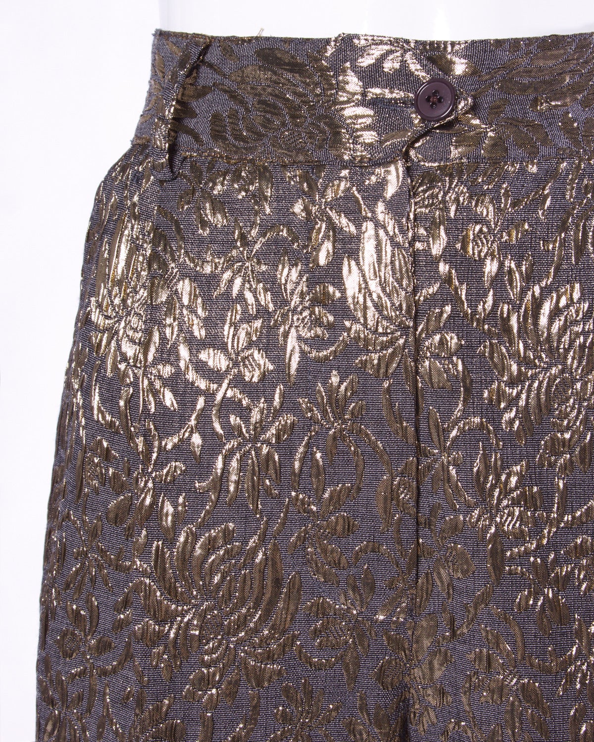 Vintage metallic brocade pants by Gianfranco Ferre. High waist and wide leg.

Details:

Unlined
Side Pockets
Front Button Closure
Color: Gold/ Dark Gray
Fabric: Feels like Silk Blend
Label: Gianfranco Ferre

Measurements:

Waist: