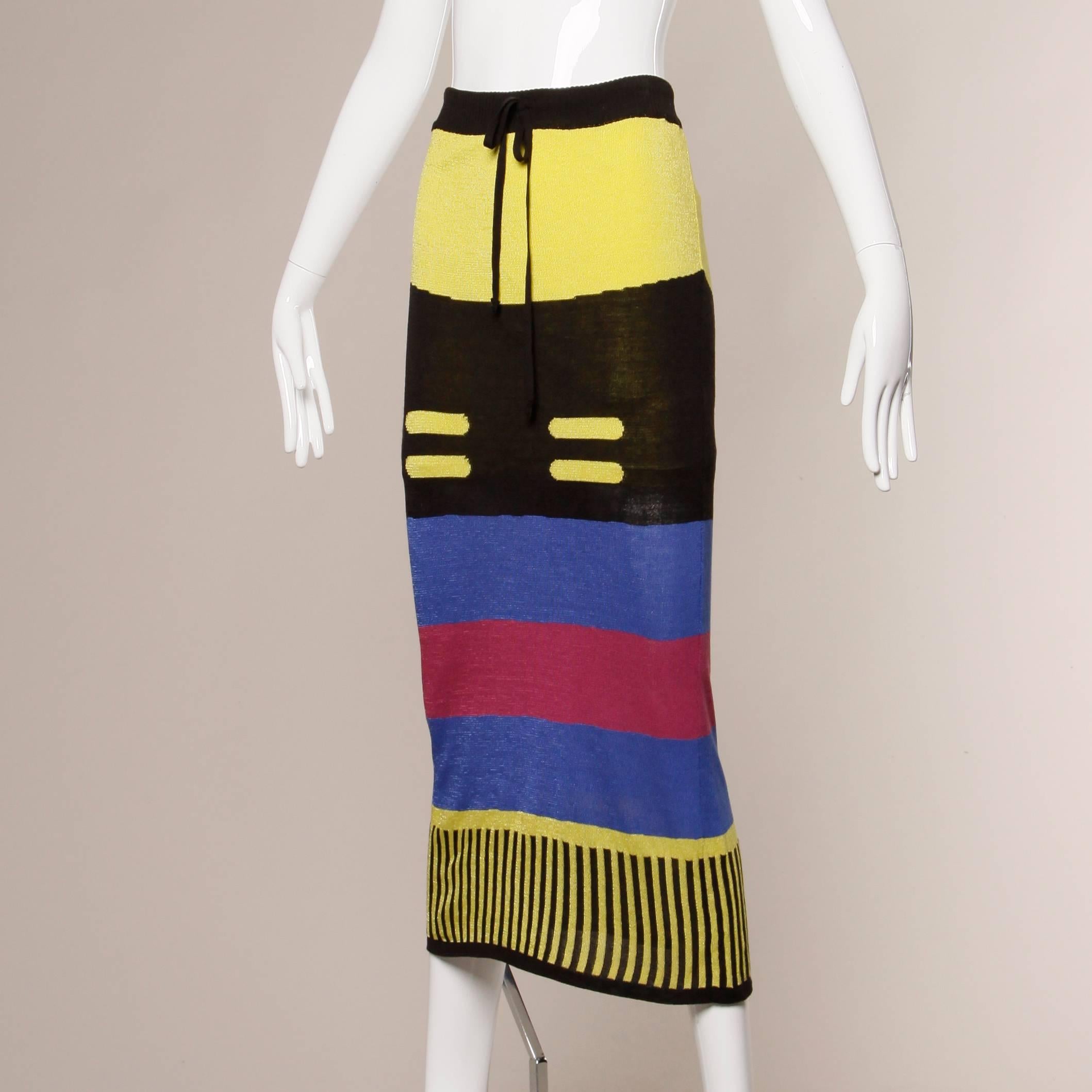 Vibrant Vivienne Westwood Anglomania knit skirt with color blocking and stripes. Drawstring detail at the waistband. Partially lined in cotton jersey knit. Marked size is small. Fits like an XS-Small. Waist measures 24