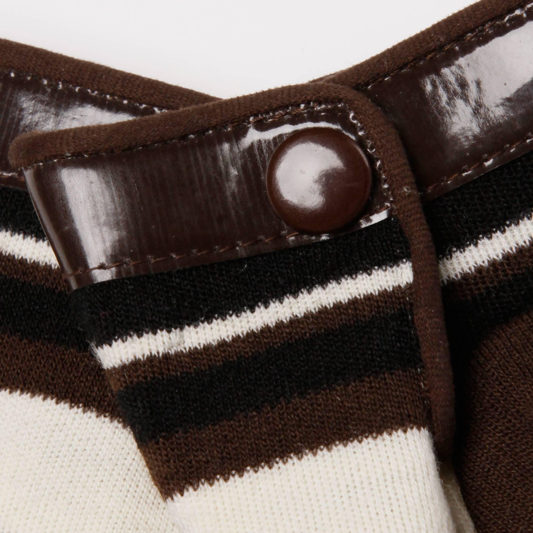 Gorgeous vintage Pierre Cardin gloves with brown vinyl trim. Gloves are wool knit in brown, black and off white stripes. Unlined. Marked size 3. Fits like a modern size medium.