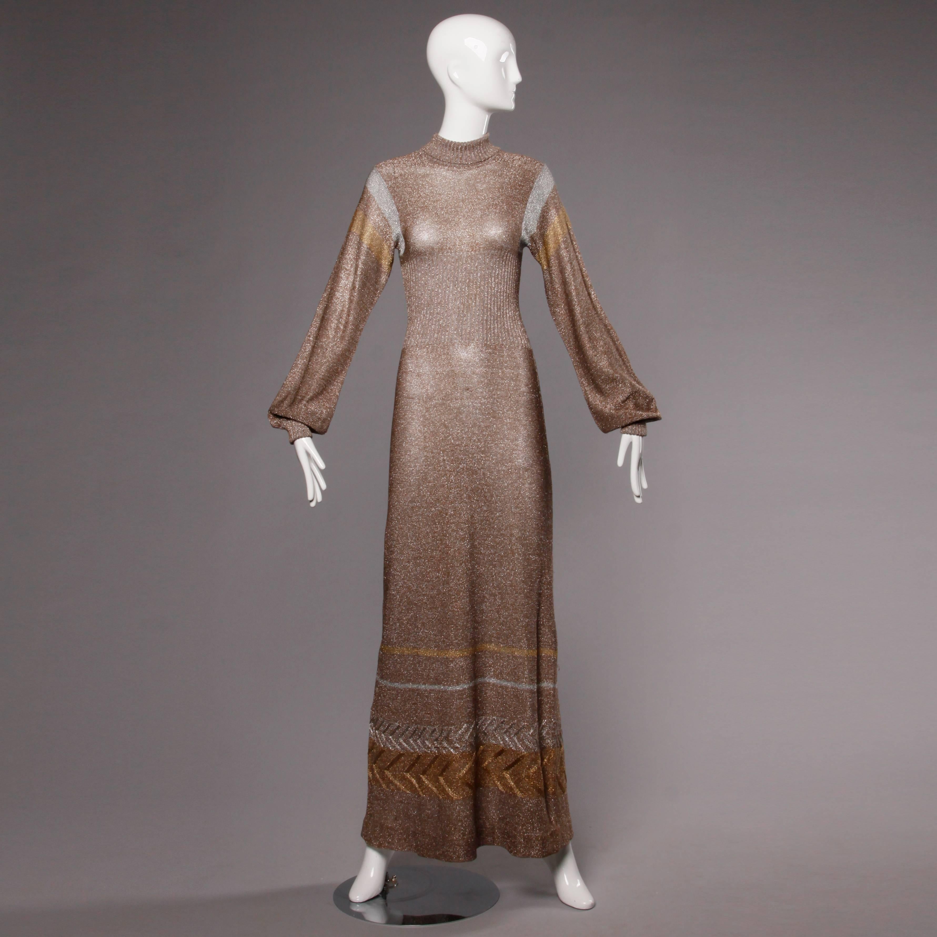 Metallic knit maxi dress with long sleeves by Wenjilli. Unlined. Rear zip closure. Marked size 9/10. Estimated size small-medium. 66% acrylic, 22% metallic, 12% polyester. The measurements are as follows:

Bust: Up to 34