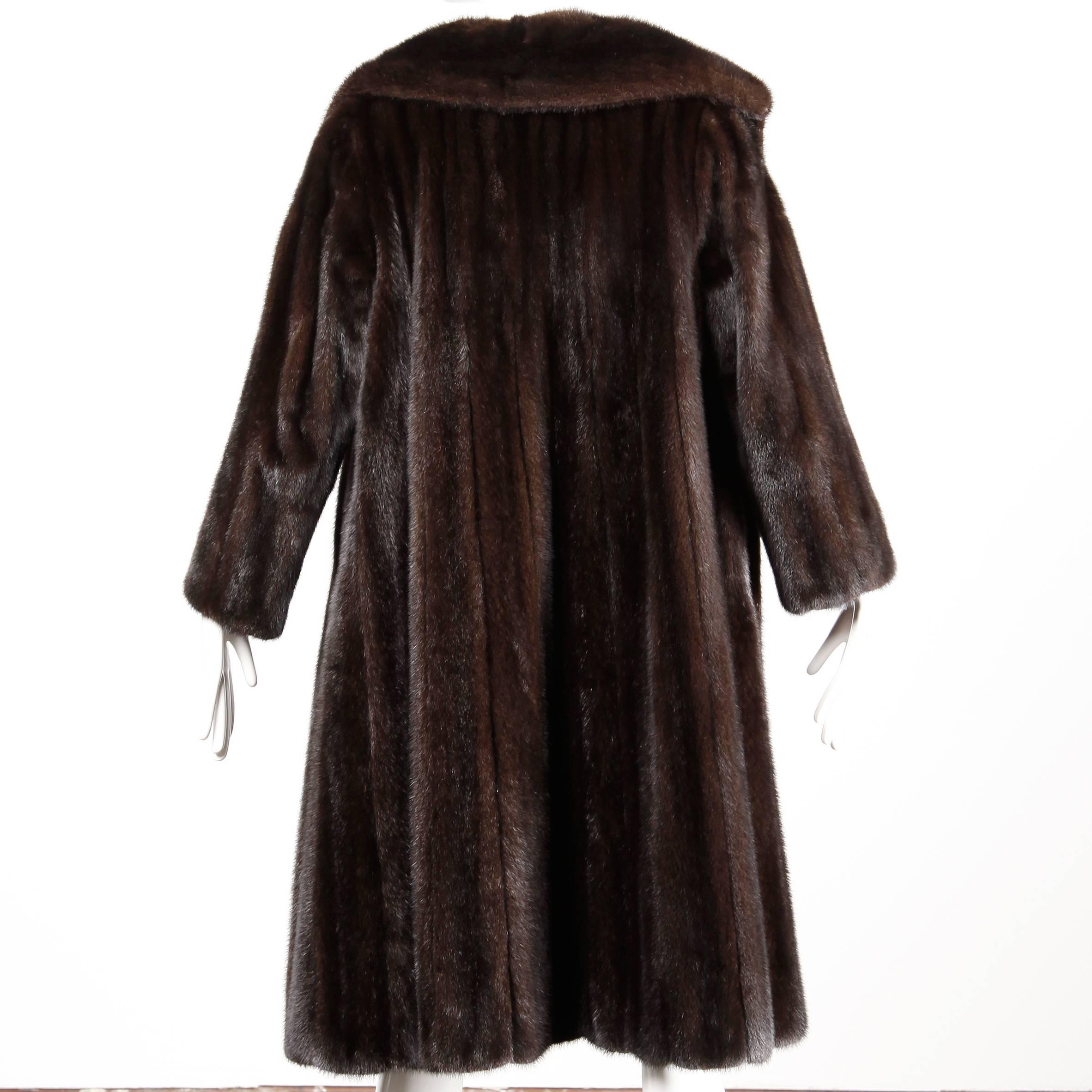 Absolutely flawless and pristine mink fur coat by Black Willow for Neiman Marcus. This coat is a custom design and features a numbered label. The pelts are in beautiful condition and are soft and supple. The original owner kept this in cold storage