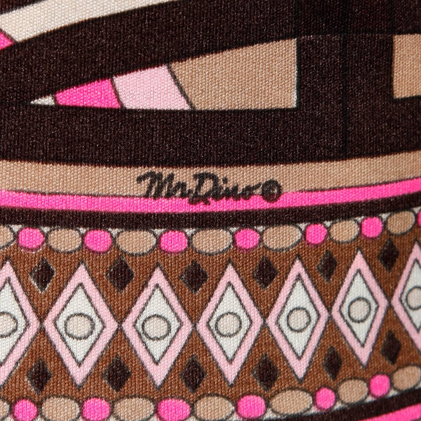 Vintage signed Mr. Dino maxi dress with full sleeves and a collar. No marked size, but fits like a modern size medium 6-8.

Details:

Unlined
Back Zip Closure
Estimated Size: Medium
Color: Dark Brown/ Pink/ Black/ Beige/ Ivory
Fabric: