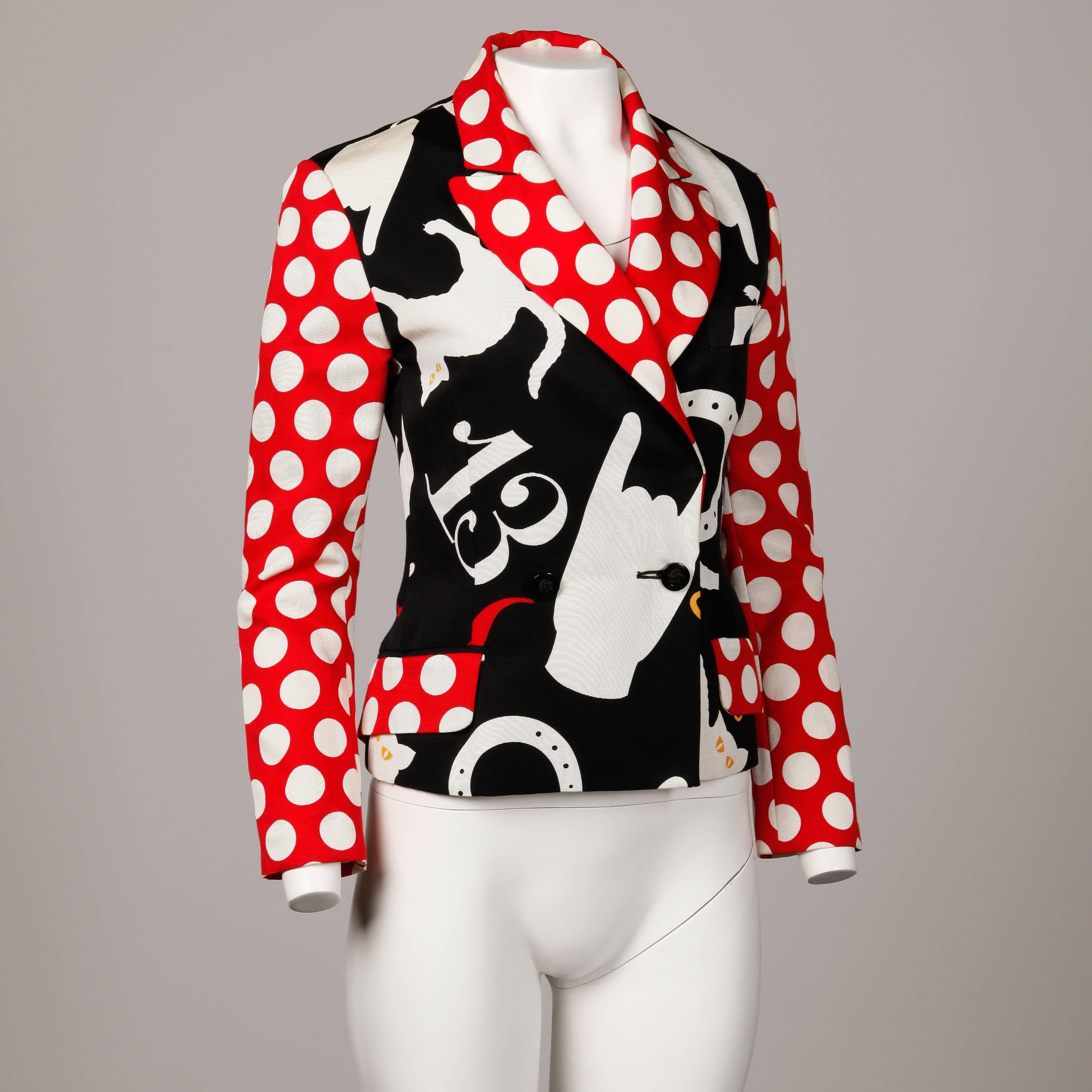 Iconic vintage Moschino blazer jacket with a "luck" themed pop art print featuring the number 13, horseshoes and a cat. Front button closure and front pockets still sewn shut. 68% Cotton, 32% Rayon fabric. Fully lined. The marked size is I