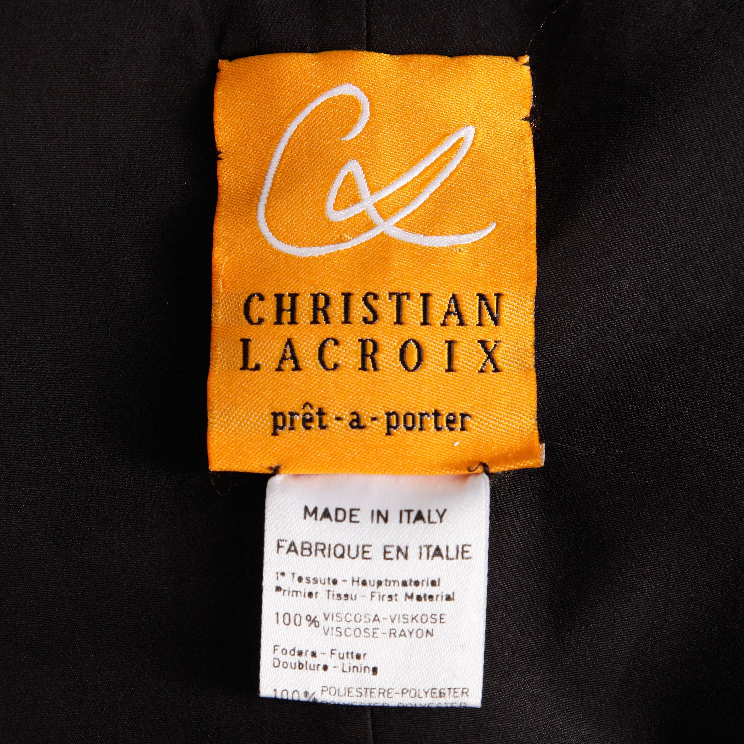 Incredible vintage Christian Lacroix strapless mini dress with a floral print and black raffia embroidered lace. Sexy iconic Lacroix! Fully lined with zip closure. The marked size is US 4, GB 30, I 38, F 36, D 32. It fits like a modern XS-S. The