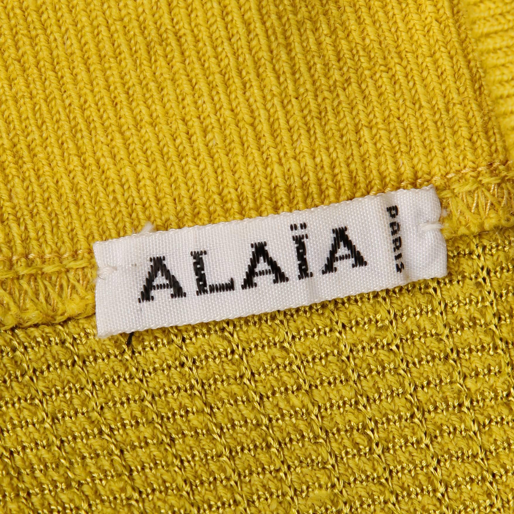 Vintage Alaia cropped turtleneck sweater in vibrant chartreuse knit! Fabric content is 50% rayon, 46% wool, 5% spandex. The marked size is medium and the sweater fits like a modern size small-medium. The bust measures 38-44", waist 24-29",
