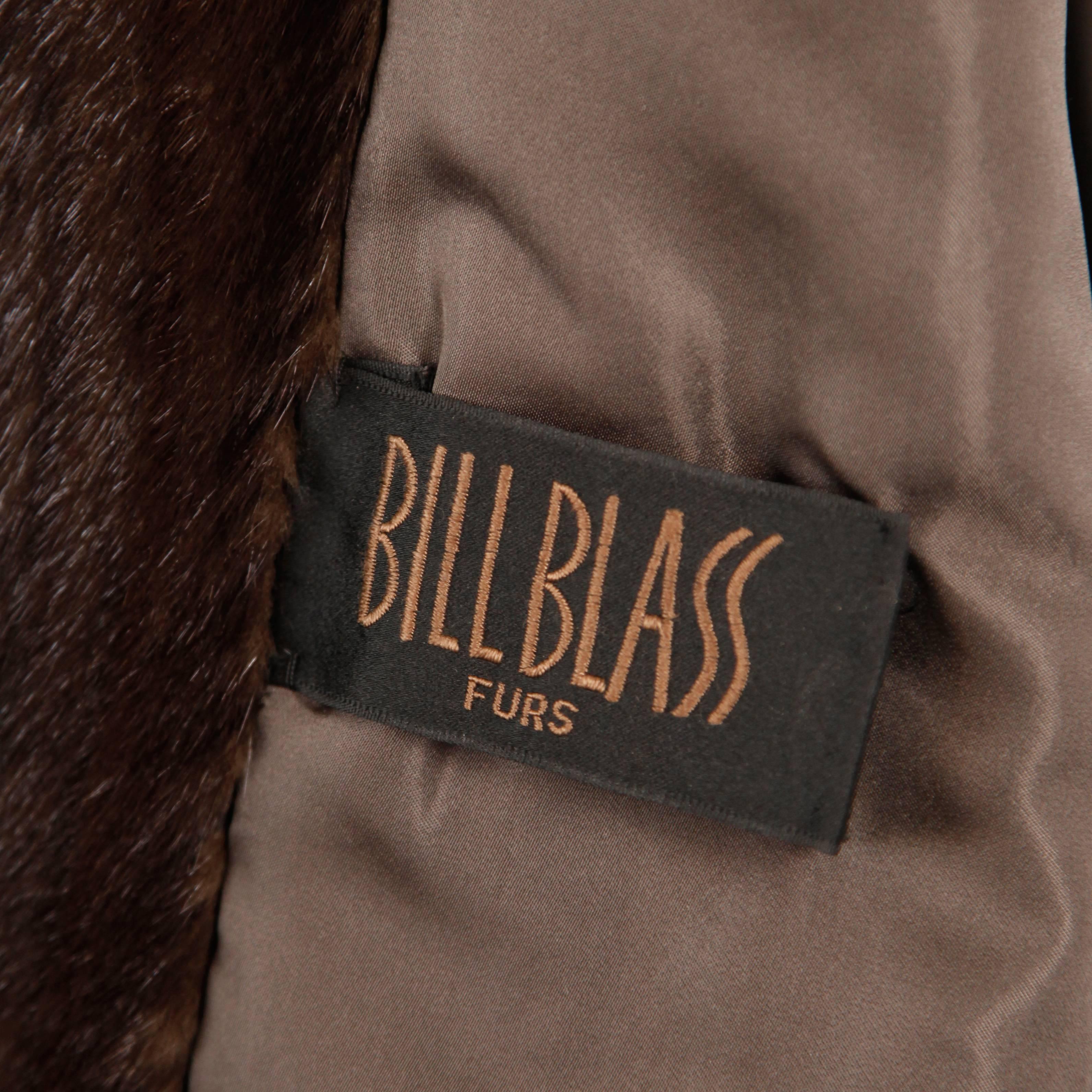 Absolutely stunning vintage brown mink fur jacket by Bill Blass. Pop up collar features fur on both sides. Sleeves are cuffed. Fully lined with no closure and monogram on the inside lining. Side pockets. Fits like a modern size medium-large. The