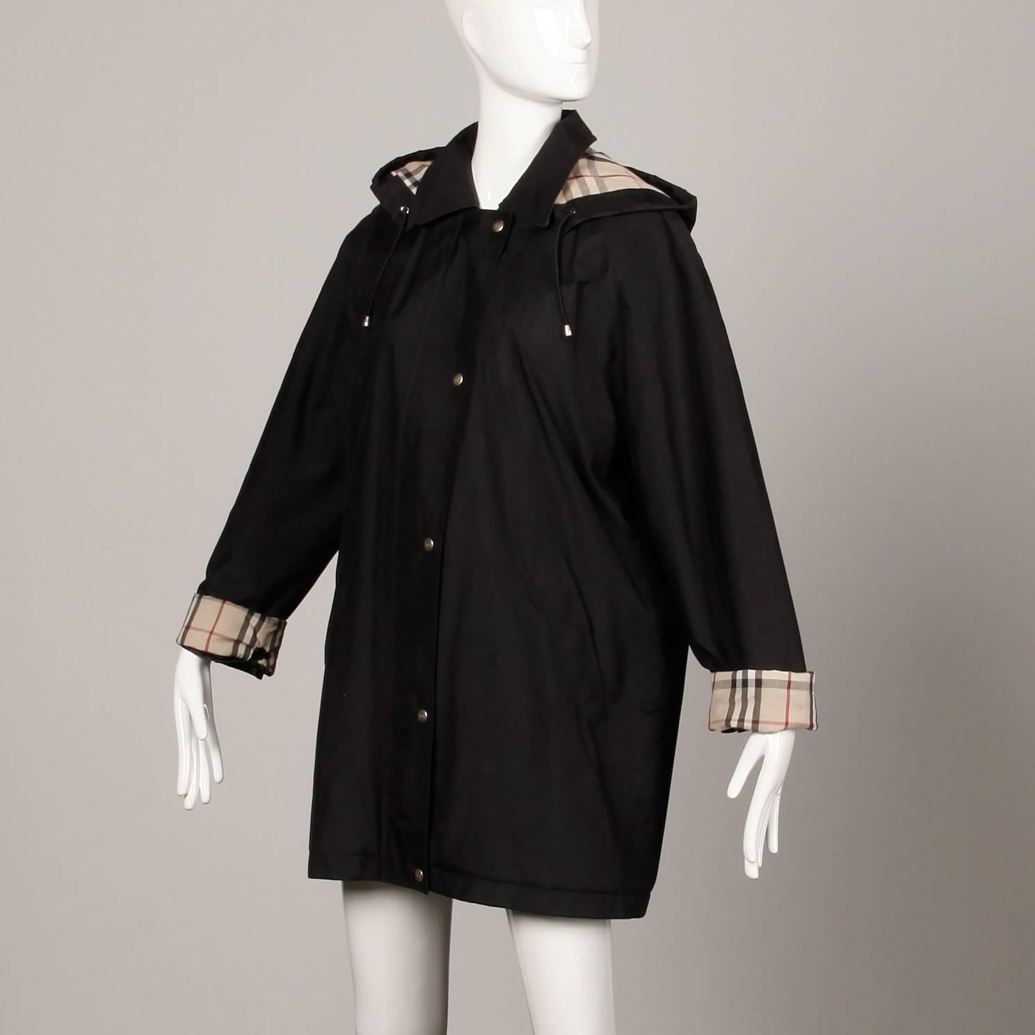Burberry Black Rain Coat or Jacket with Nova Plaid Lining + Detachable Hood  at 1stDibs | burberry rain jacket, plaid lined jacket, burberry rain jacket  with hood
