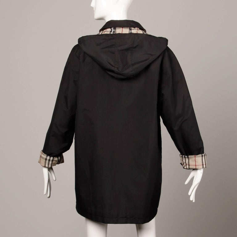 Burberry Black Rain Coat or Jacket with Nova Plaid Lining + Detachable Hood  at 1stDibs | burberry rain jacket, burberry rain coat with hood, burberry  rain jacket with hood