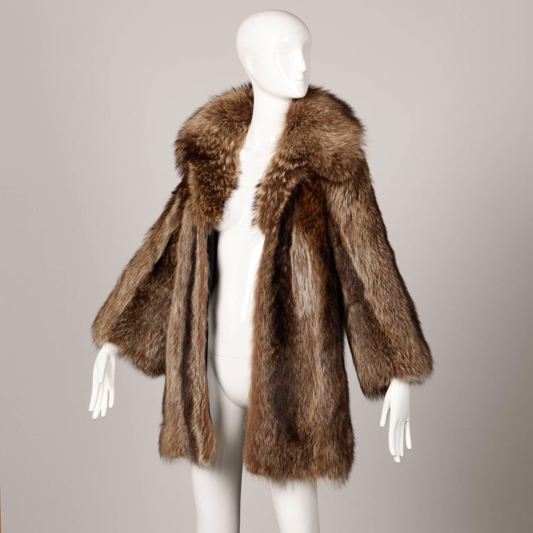 1970s Vintage Raccoon Fur Coat with Pop Up Collar and Leather Trim at