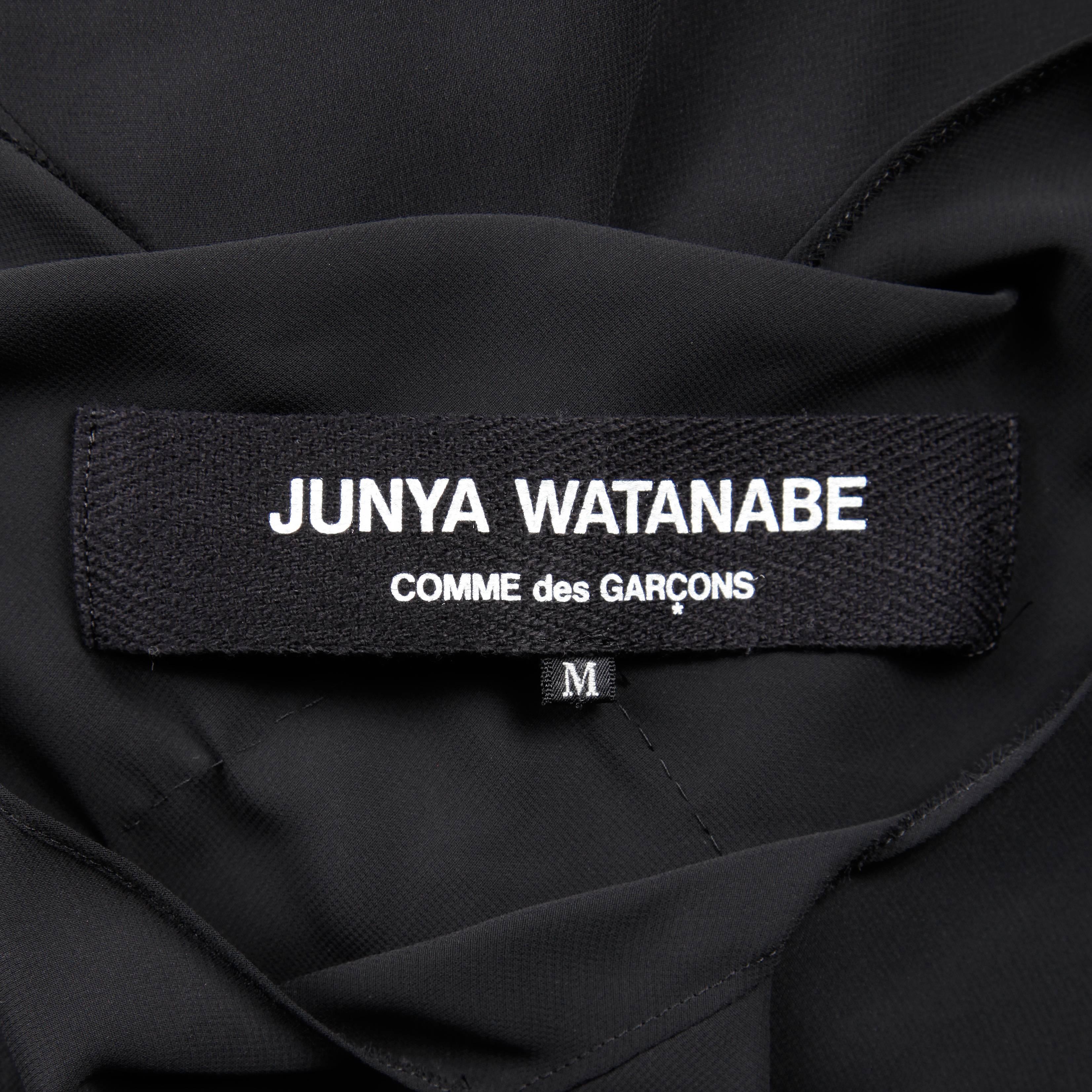 Incredible Junya Watanabe for Comme des Garcons black avant garde draped dress. Partially lined, no closure (pulls on over the head). The marked size is medium. The bust measures 36", waist 28", hips 35" and the total length 45".