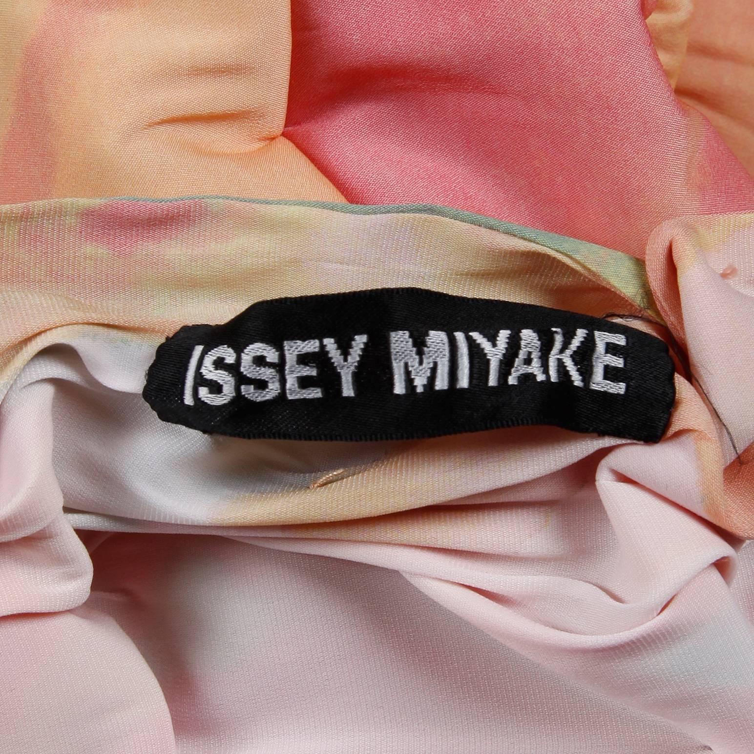 Incredible vintage multicolor jacket by Issey Miyake. Unlined with front button closure. Fits like a modern size medium. The bust measures 44