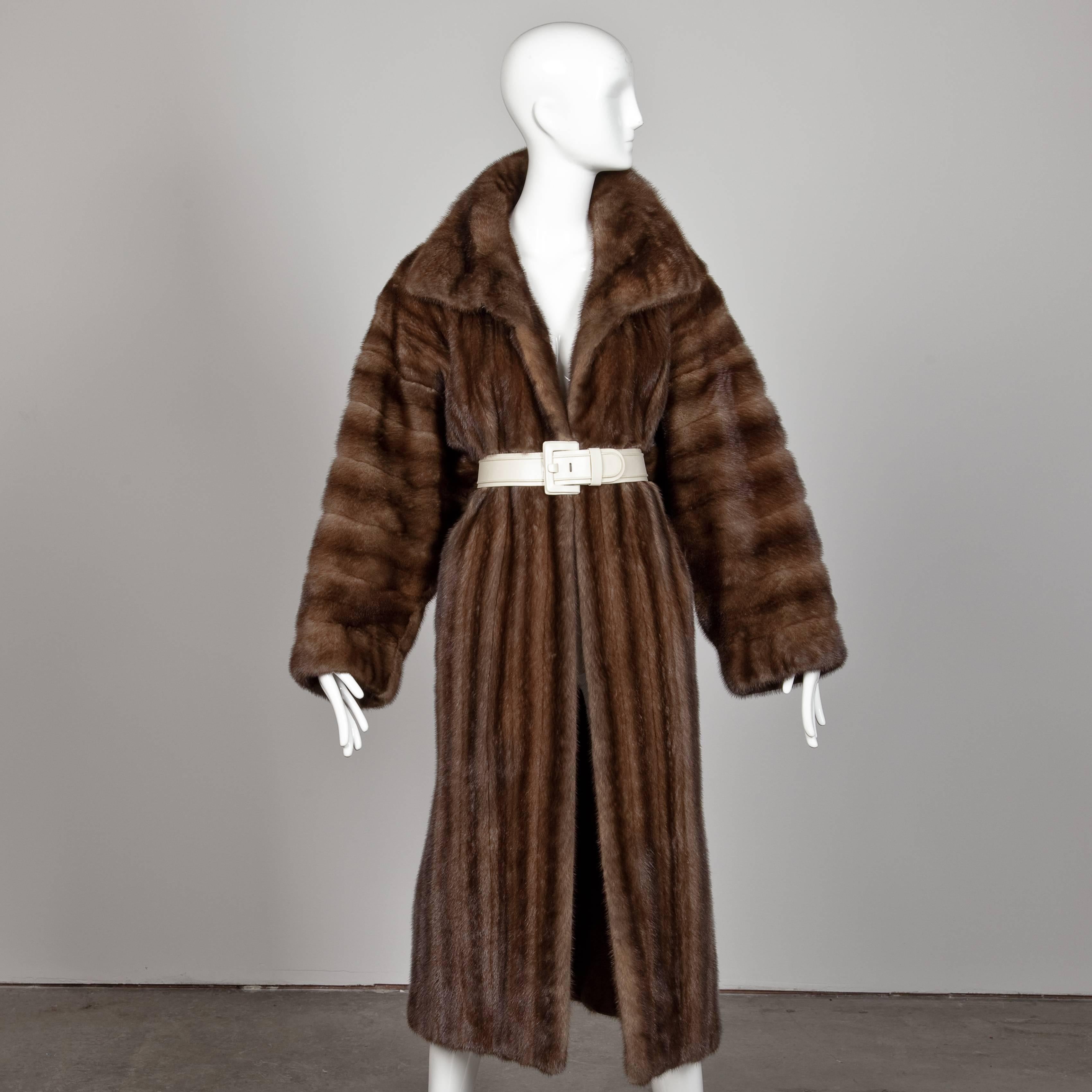 Absolutely spectacular vintage coat by James Galanos for Neiman-Marcus. At the time this was made, Galanos fur was the most expensive fur sold in the US.  Stunning mahogany female mink fur is in excellent condition and was always stored in cold