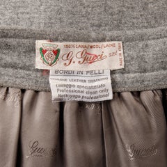 1970s Gucci Vintage Gray Wool + Brown Leather Skirt with Horse Bit Buckle Design