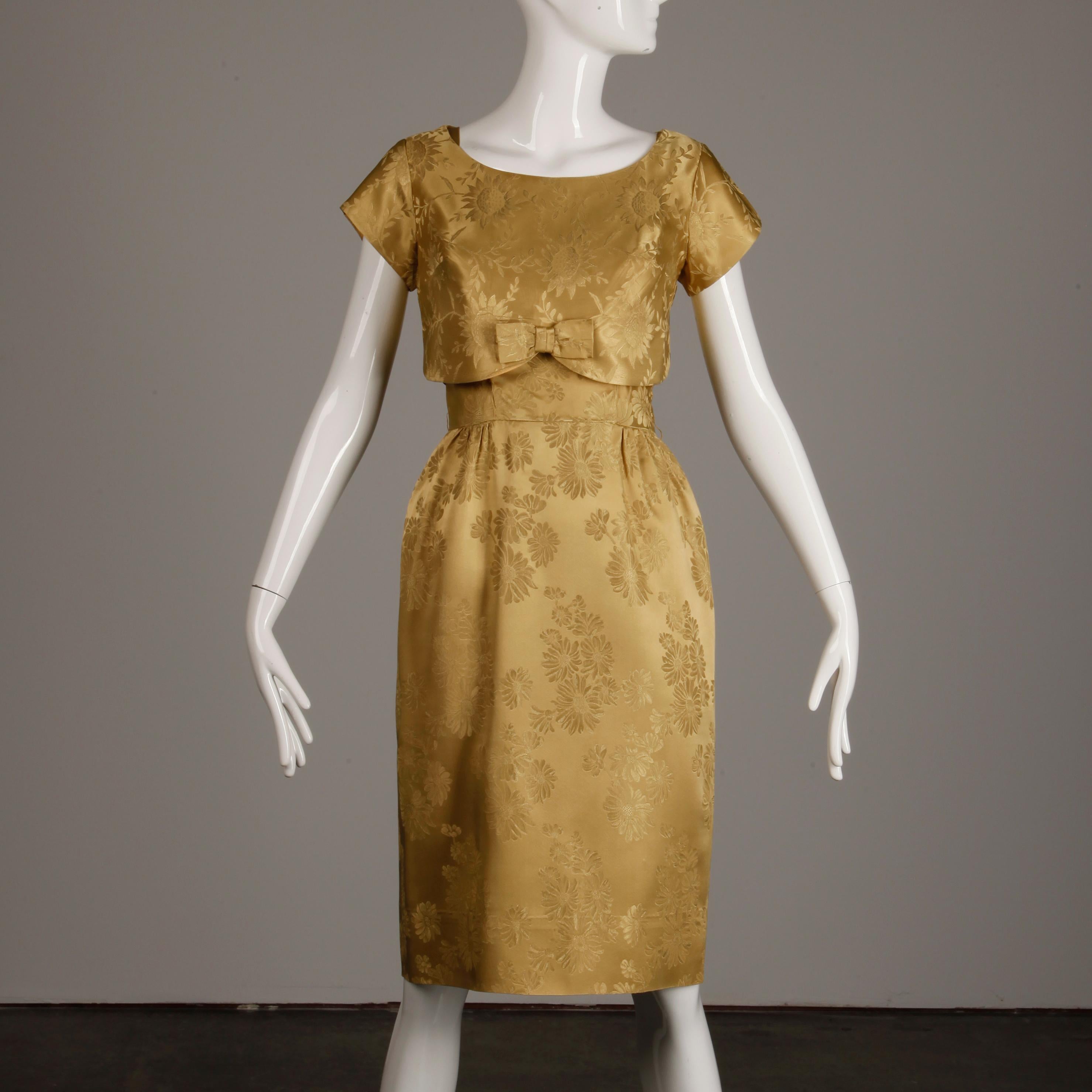 Vintage 1960s 2-piece gold brocade cocktail dress. Wear it with or without the top piece! The dress is fully lined with rear metal zip and hook closure. Fits like a modern XS-S. The bust measures 37