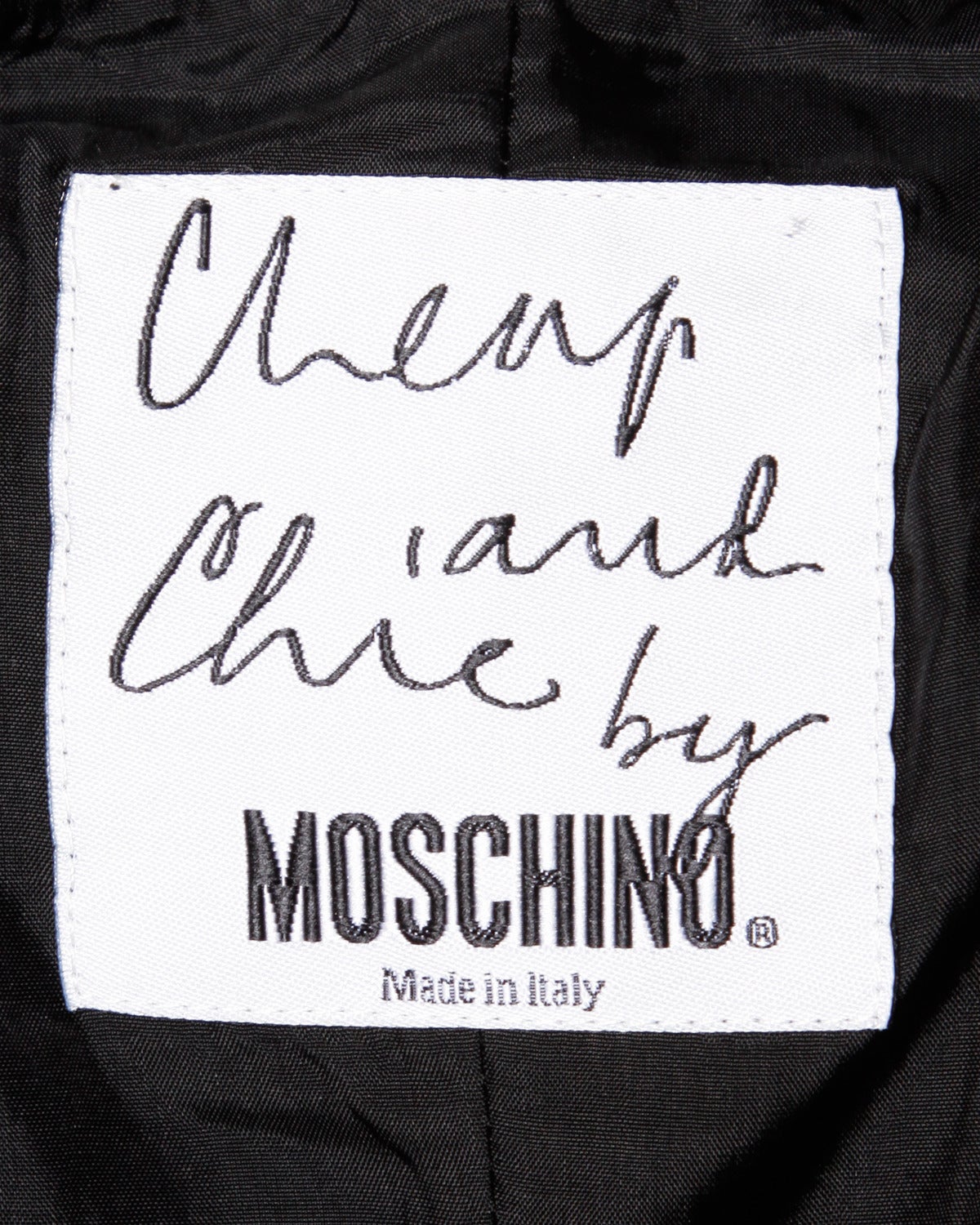 Moschino - Mini robe noire vintage à découpes et nœud papillon, années 1990  en vente 1