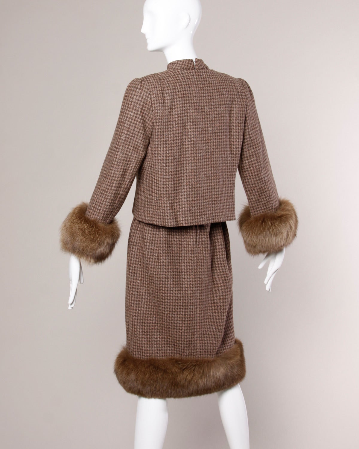 Wool dress and jacket ensemble with plush fox fur trim by Richilene for Elizabeth Arden. Both pieces can be worn separately or together!

Details:

Fully Lined
Side Pockets
Hook Closure On Jacket
Back Zip and Hook Closure On Dress
Estimated