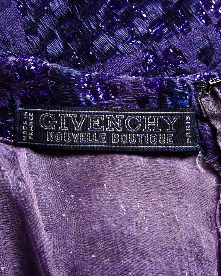 Incredibly rare Hubert de Givenchy metallic purple maxi dress from 1971 with the orginal Gump's Department Store tags attached from San Francisco. This dress was never worn! 

The dress features tapestry-like jacquard fabric with a reflective