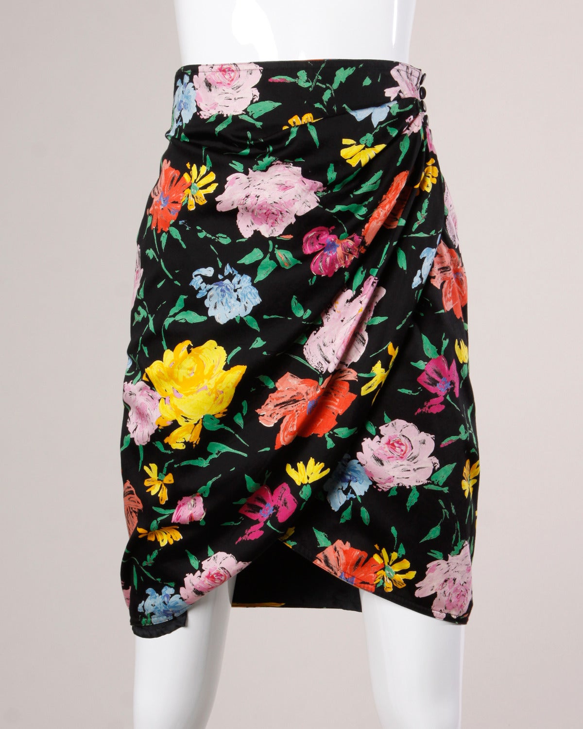 Vintage quilted jacket and skirt set by Emanuel Ungaro with a colorful floral print. Both pieces can be worn together or separately!

Details:

Fully Lined
Front Snap Closure On Jacket
Side Button and Clasp Closure On Skirt
Marked Skirt Size: