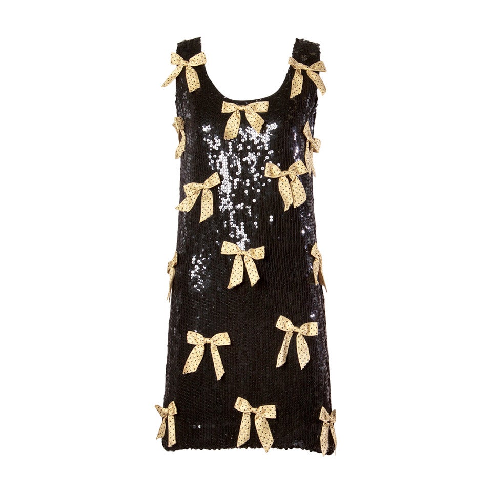 Jeanette Kastenberg, vestito vintage di paillettes nere con fiocchi d'oro metallici in vendita