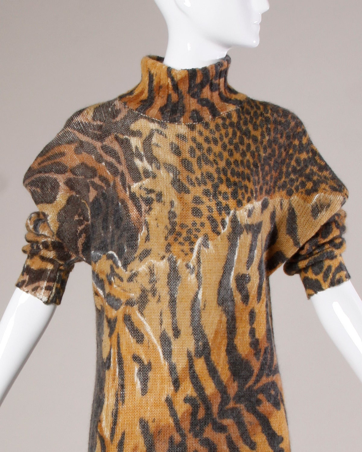 Iconic Krizia oversized knit tunic or jumper in animal print. 

Details:

Unlined
No Closure/ Fabric Contains Stretch
Marked Size: 44
Color: Burnt Umber/ Black/ White/ Copper
Fabric: Wool/ Mohair/ Acrylic/ Nylon
Label: Krizia
