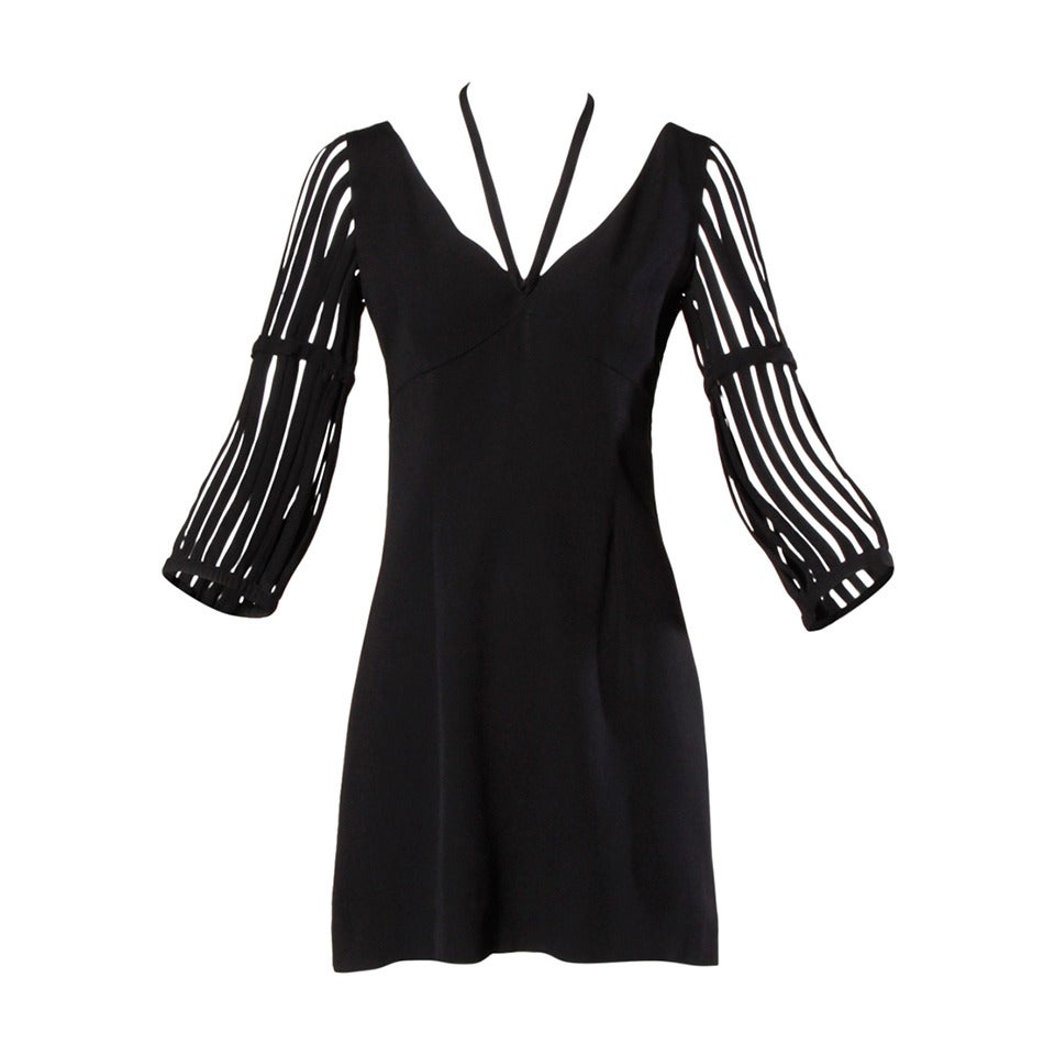Moschino Vintage 1990s Cut Out Cage Sleeves Black Dress at 1stDibs