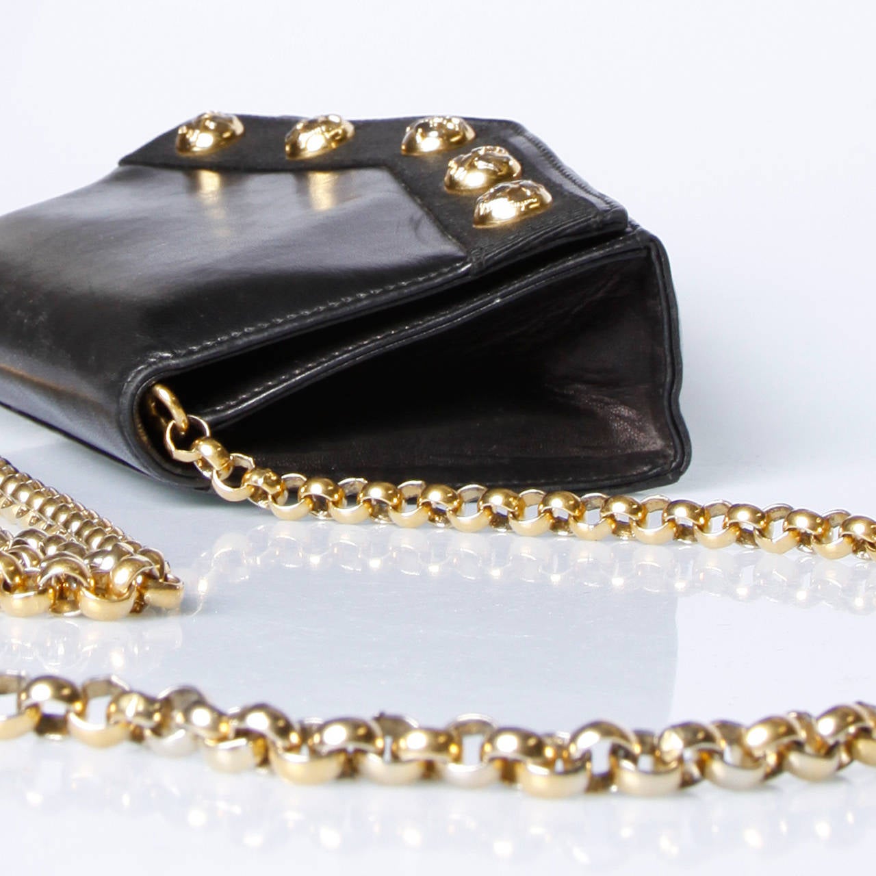 black and gold studded bag