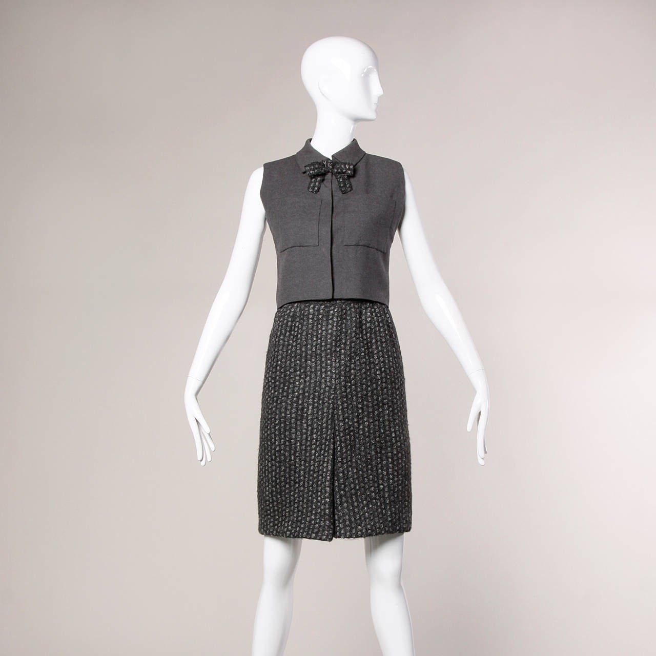 Absolutely stunning 1960s Italian couture skirt suit featuring a shell top, skirt, jacket and ascot bow tie that can be worn together or separately. Karl Lagerfeld designed for this Italian couture house and this ensemble was likely one of his early