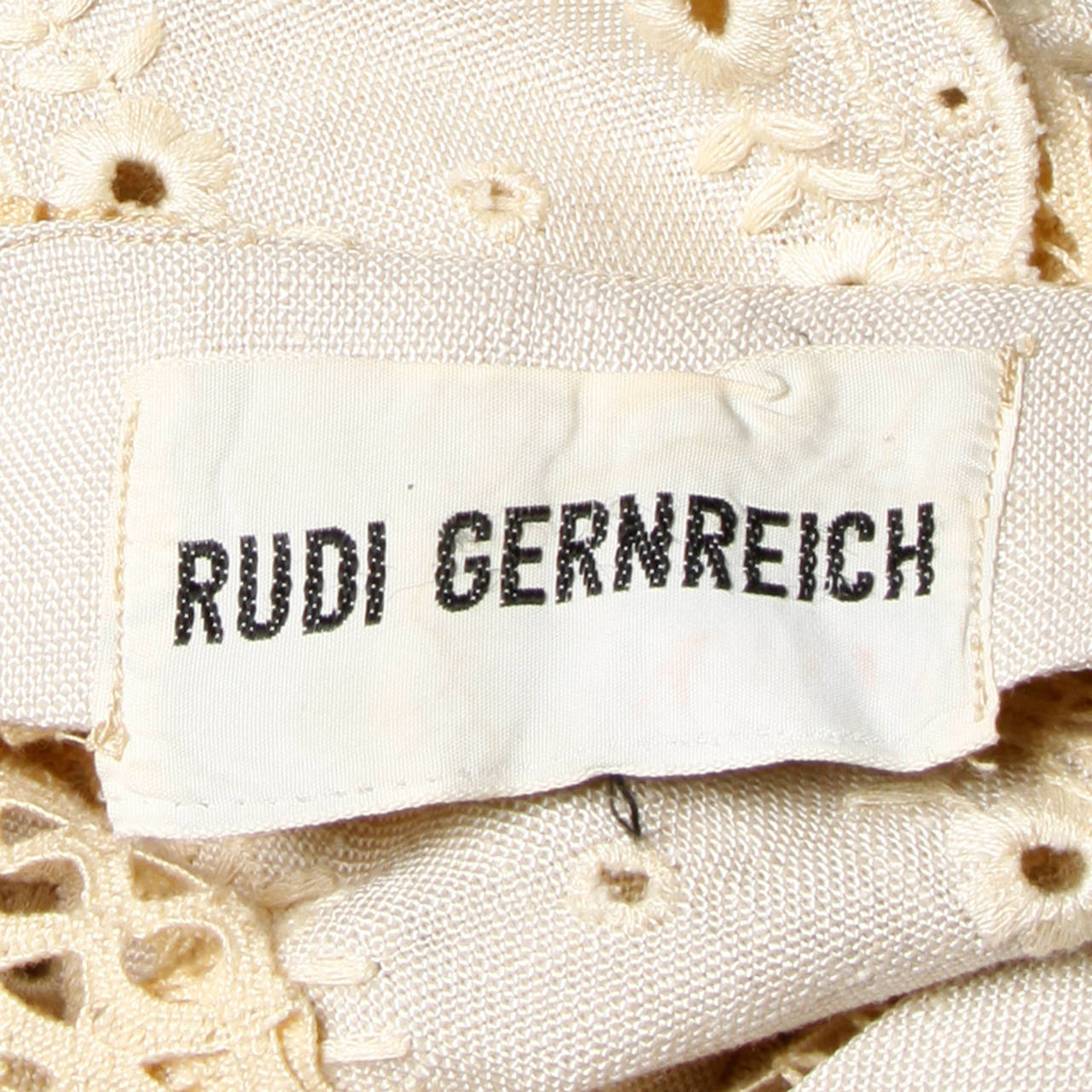 Rare vintage 1960s Rudi Gernreich scalloped lace and linen button up dress. 

Details:

Unlined
Front Button Closure
Marked Size: Not Marked
Estimated Size: S-M
Color: Off White/ Beige Taupe
Fabric: Linen/ Lace
Label: Rudi