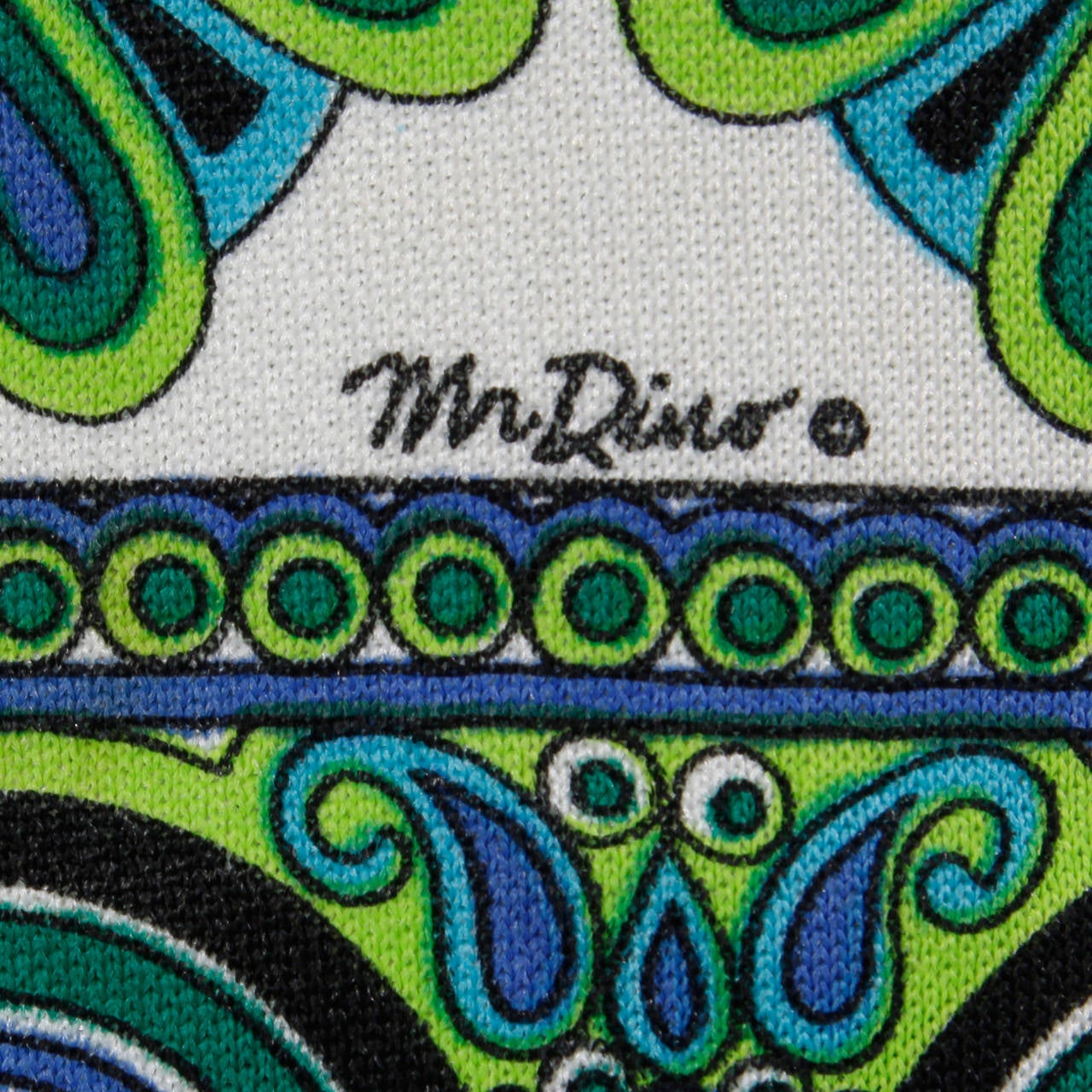Collectible vintage Mr. Dino dress that is signed in the print. Flared sleeves and vibrant design.

Details:

Unlined
Back Zip and Hook Closure
Marked Size: 14
Estimated Size: Large
Color: Neon Green/ Bright Purple/ Bright Azure Blue/
