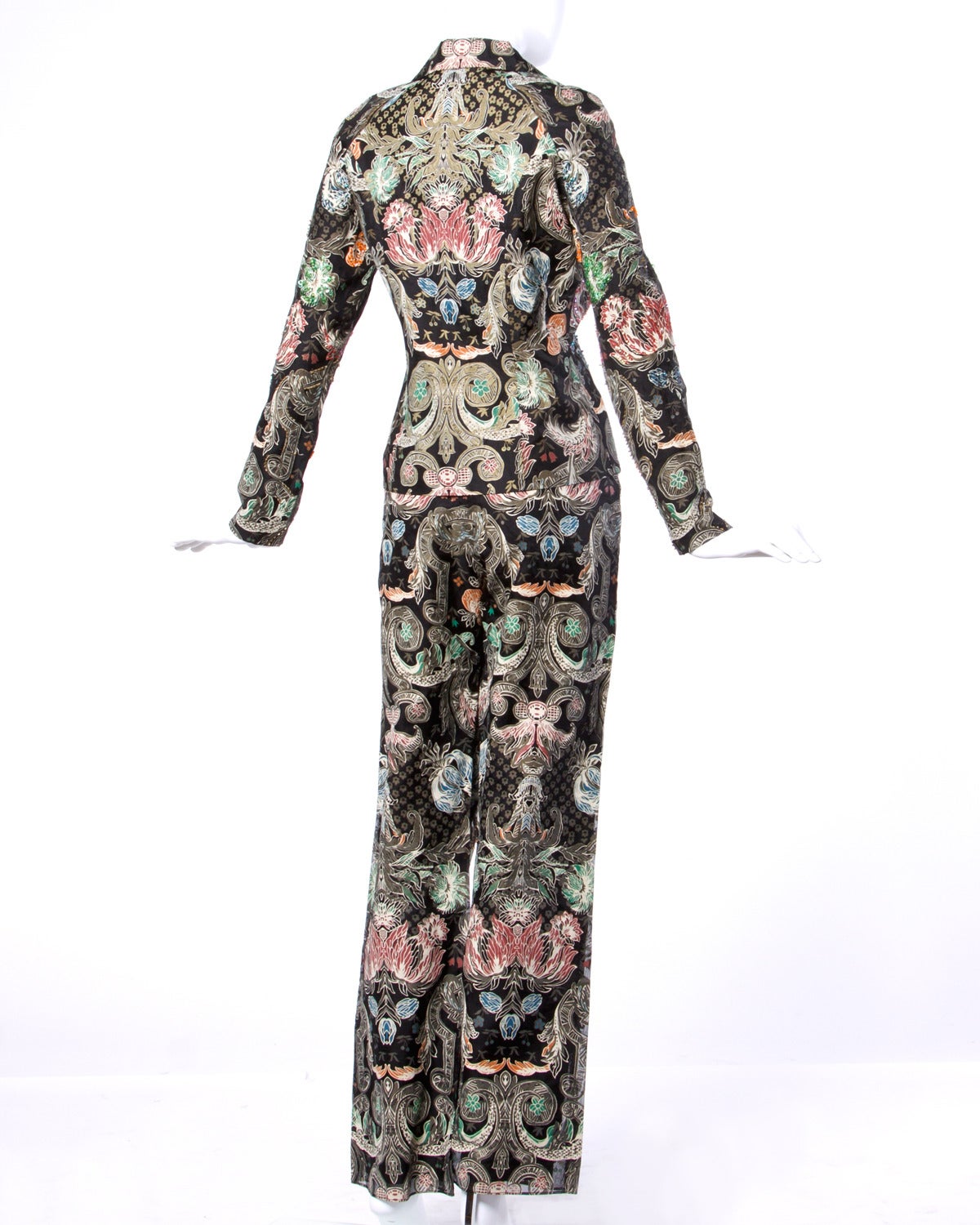 Gorgeous colorful screen printed silk 2-piece pants suit embellished with sequins and beads. Both pieces can be worn together or separately!

Details:

Fully Lined
Shoulder Pads Sewn Into Lining
Front Button Closure On Top/ Side Zip Hook