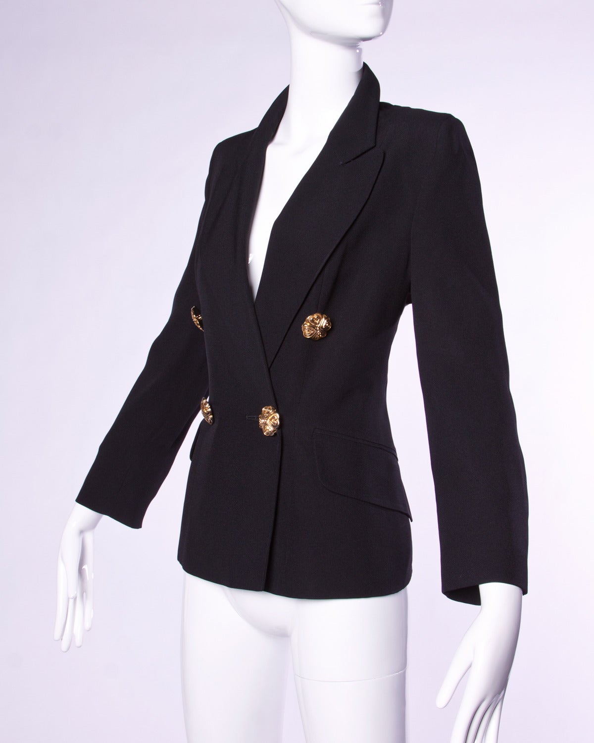 Vintage 1991 Franco Moschino black blazer jacket with heart buttons and colorful lining. 

Details:

Fully Lined
Shoulder Pads Sewn Into Lining
Front Button Closure
Marked Size: US 8/ I 42/ D 38/ F 38/ GB 10
Color: Black
Fabric: Rayon