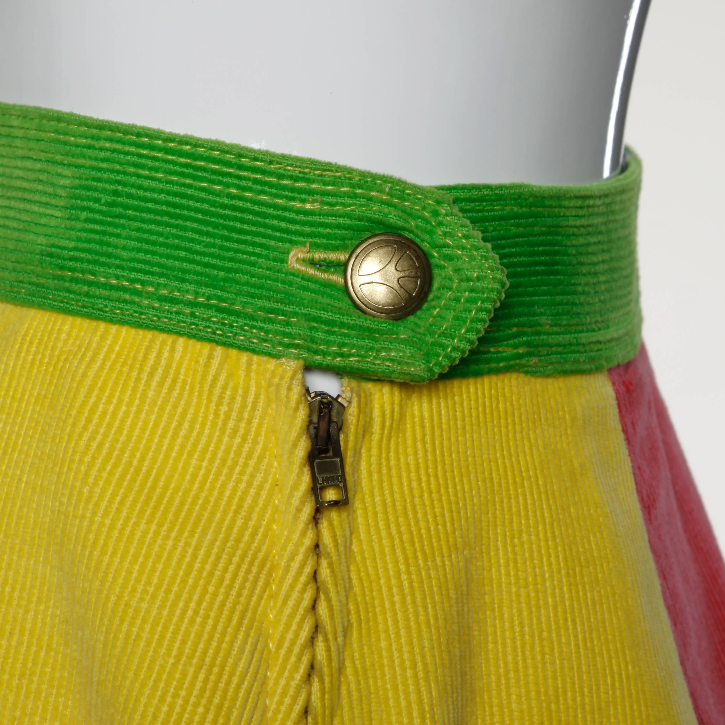 Bright color block mini skirt by Moschino Jeans in green, orange and yellow.

Details:

Fully Lined
Front Pockets
Side Metal Zip and Button Closure
Marked Size: Not Marked
Estimated Size: Small-Medium
Color: Bright Yellow/ Orange/
