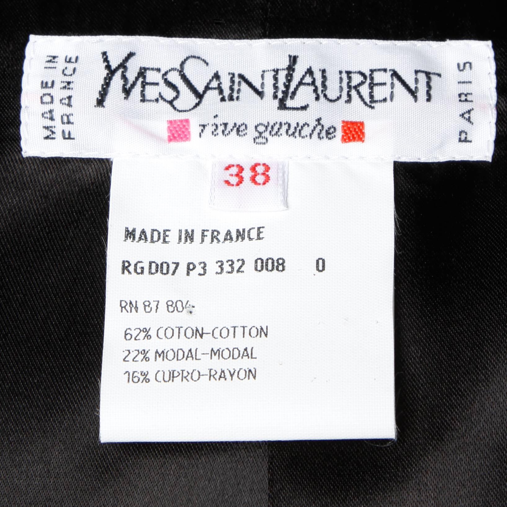 Beautiful deep burgundy velvet skirt suit by Yves Saint Laurent. Black trim and buttons.

Details:

Fully Lined
Jacket Front Pockets/ Skirt Side PocketsShoulder Pads Sewn Into Lining
Jacket Front Button Closure/ Skirt Side Zip and Button