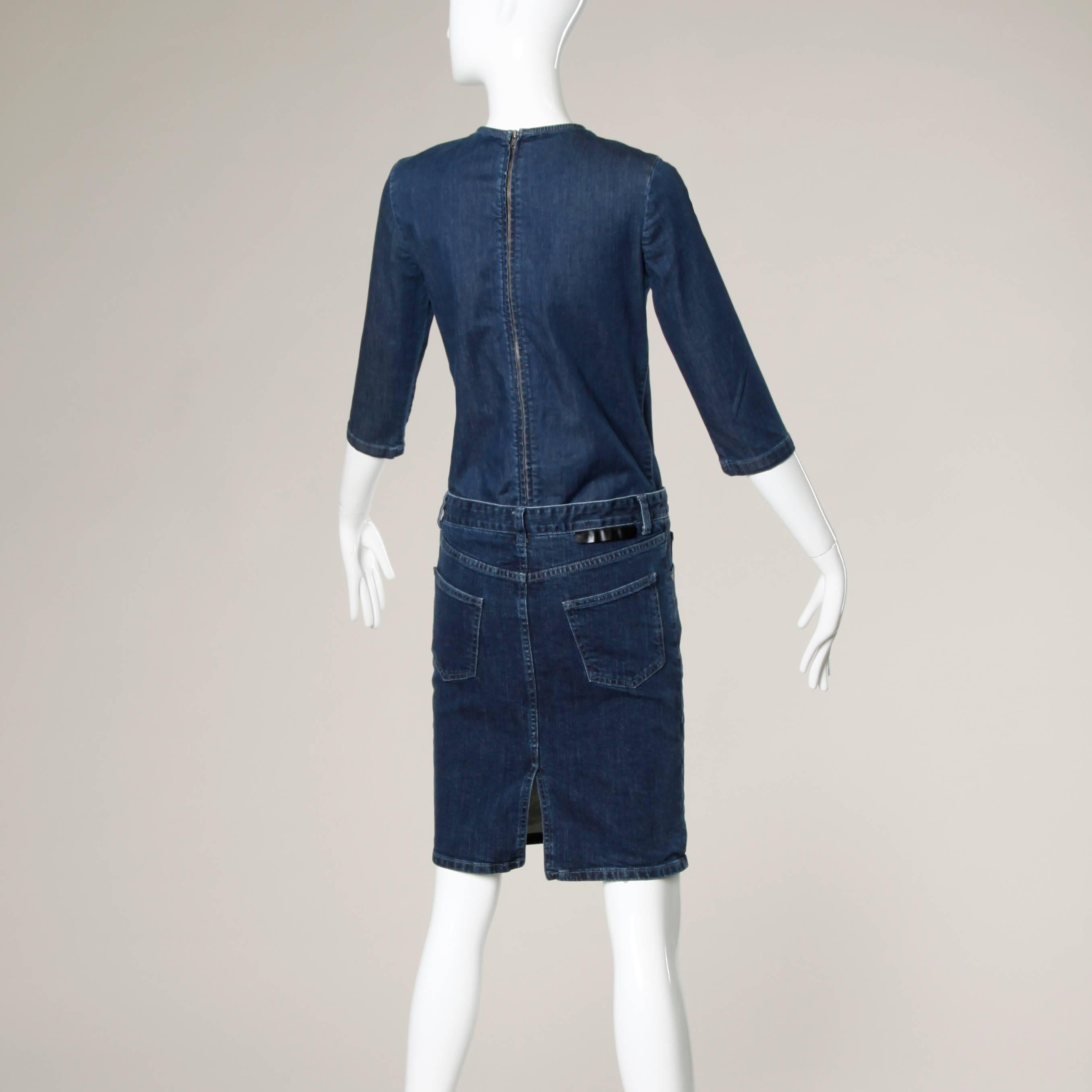 Slightly stretchy Stella McCartney denim dress cut to look like a matching skirt and top. This is actually one piece.

Details:

Unlined
Front and Back Pockets
Back Metal Zip Closure 
Marked Size: 36
Estimated Size: Small
Color: