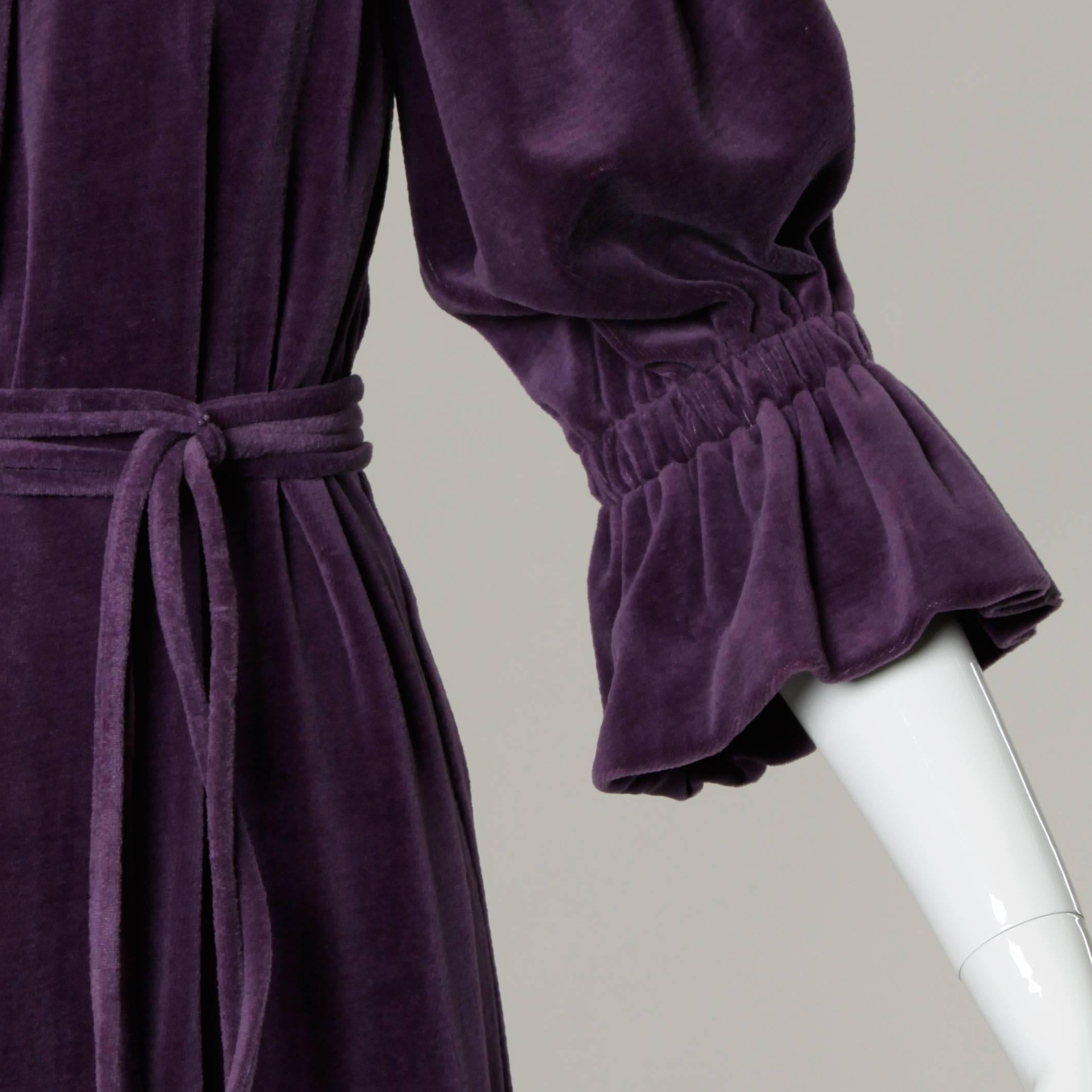 Rich purple velvet bohemian-inspired dress with a matching waist sash and full 3/4 length sleeves by Lucie Ann Beverly Hills.

Details:

Unlined
Matching Waist Tie
No Closure
Marked Size: Not Marked
Estimated Size: M
Color: Purple 
Fabric: