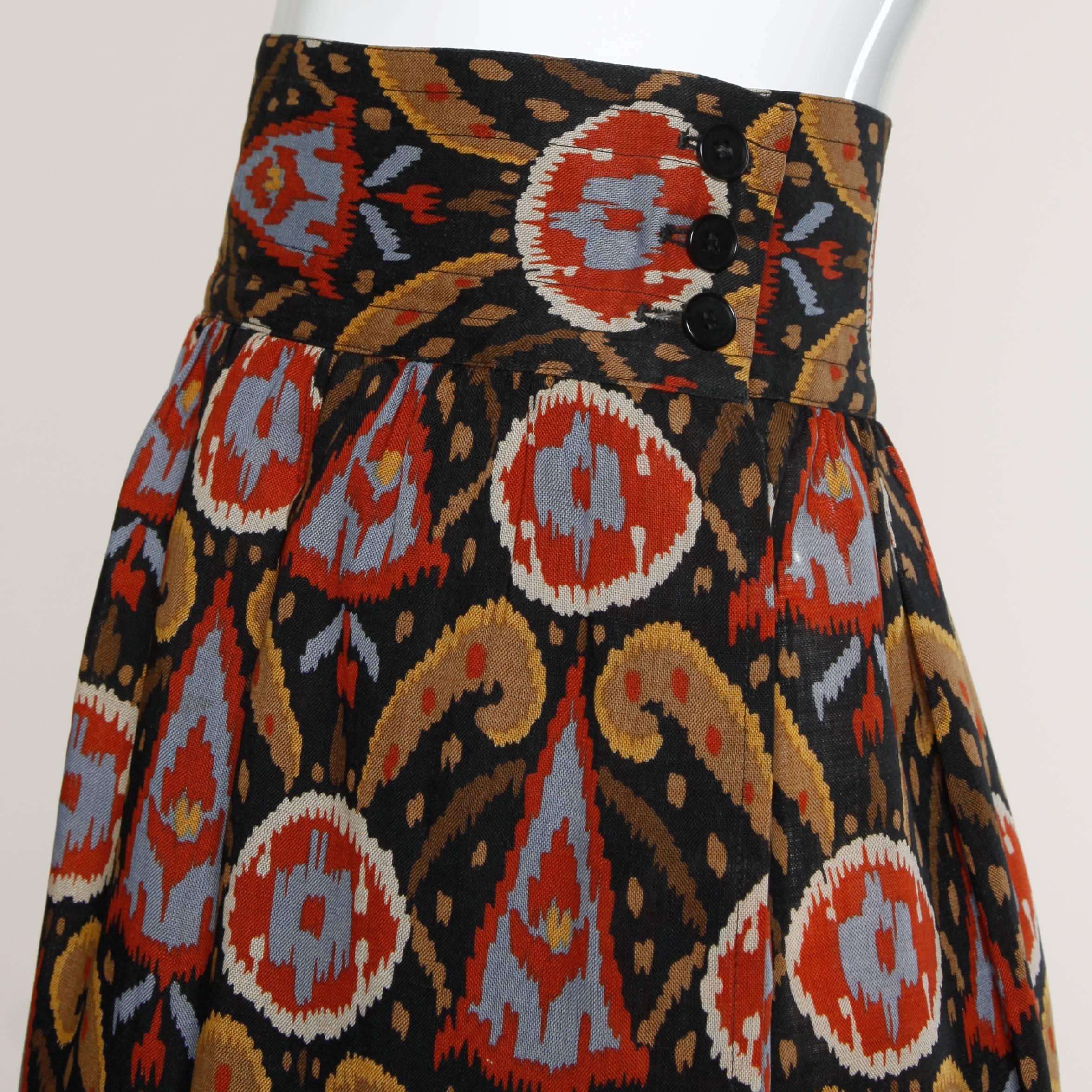 Gorgeous vintage Yves Saint Laurent Rive Gauche ikat-inspired printed wool skirt with belt tie.

Details:

Unlined
Side Pockets
Side Hook and Button Closure 
Marked Size: 42
Color: Black/ Burnt Orange/ Blue/ Beige/ Dark Green
Fabric: 100%