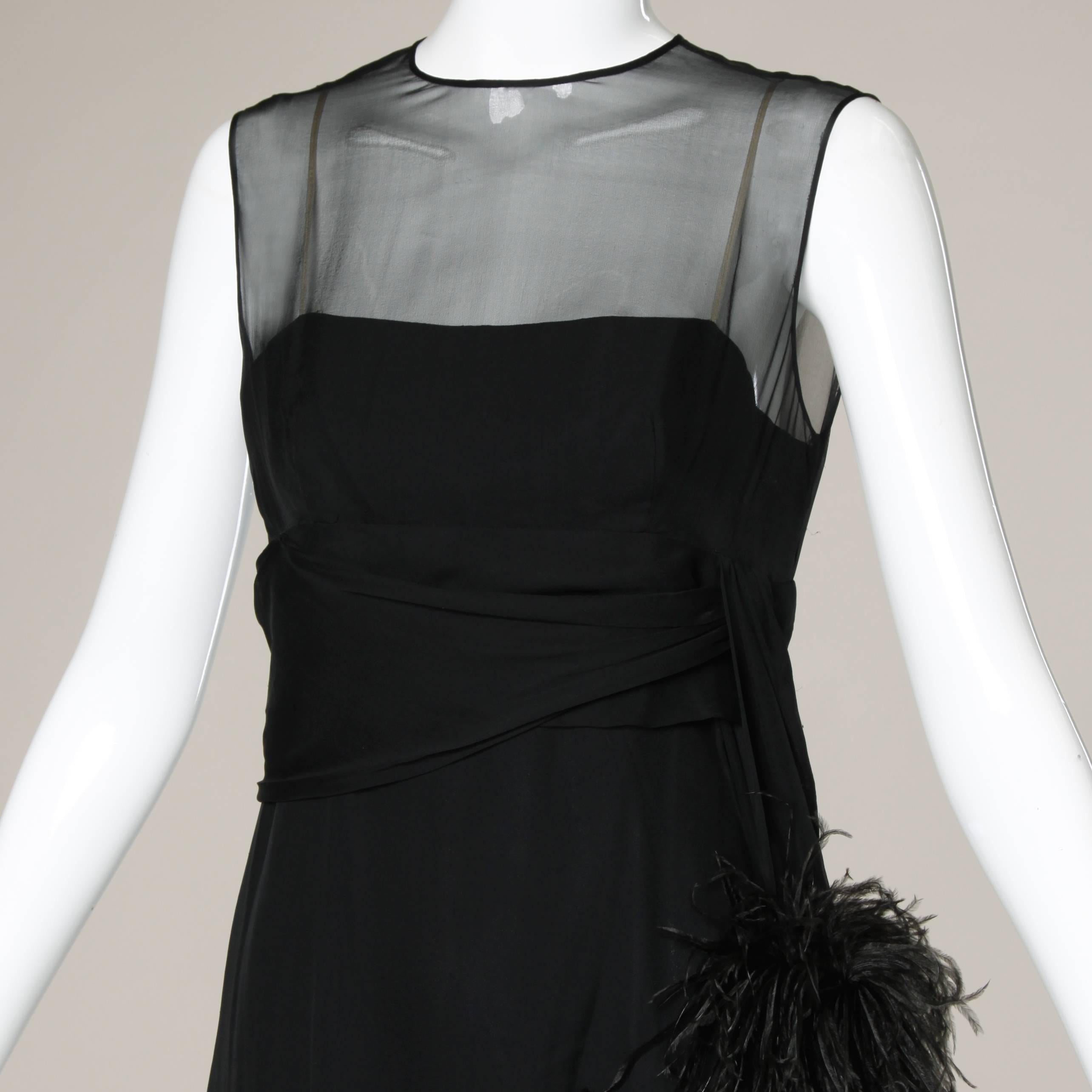 Phenomenal delicate silk chiffon dress with ostrich feather trim by Pat Sandler. 

Details:

Partially Lined
Back Zip, Hook and Button Closure
Marked Size: Not Marked
Estimated Size: Small-Medium
Color: Black
Fabric: Silk/ Ostrich Feathers
Label: