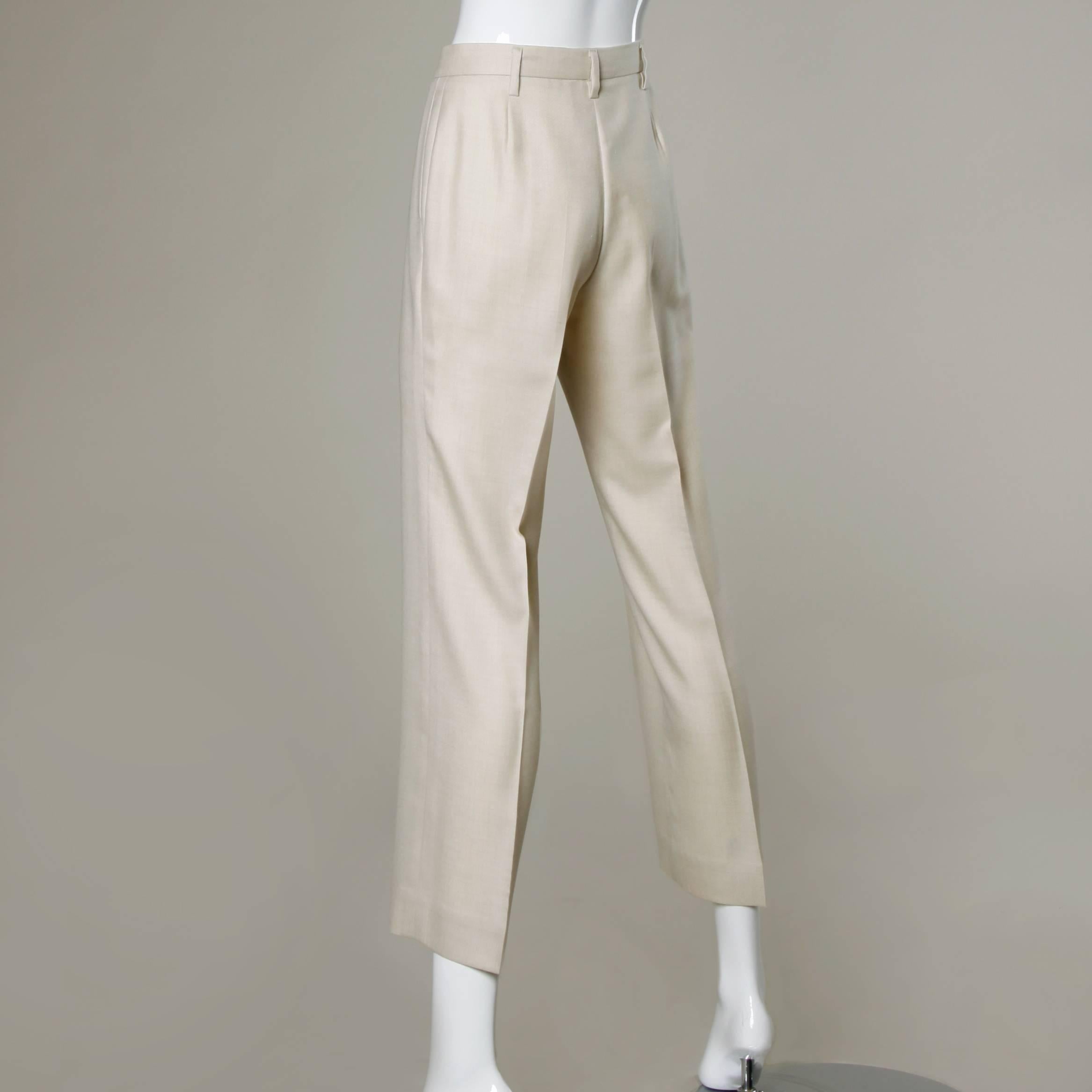 Details:

Unlined
Side Pockets
Front Zip and Hook Closure
Marked Size: 34
Color: Off White
Fabric: Not Marked/ Feels like Wool Blend
Label: Jill Sander

Measurements:

Waist: 28