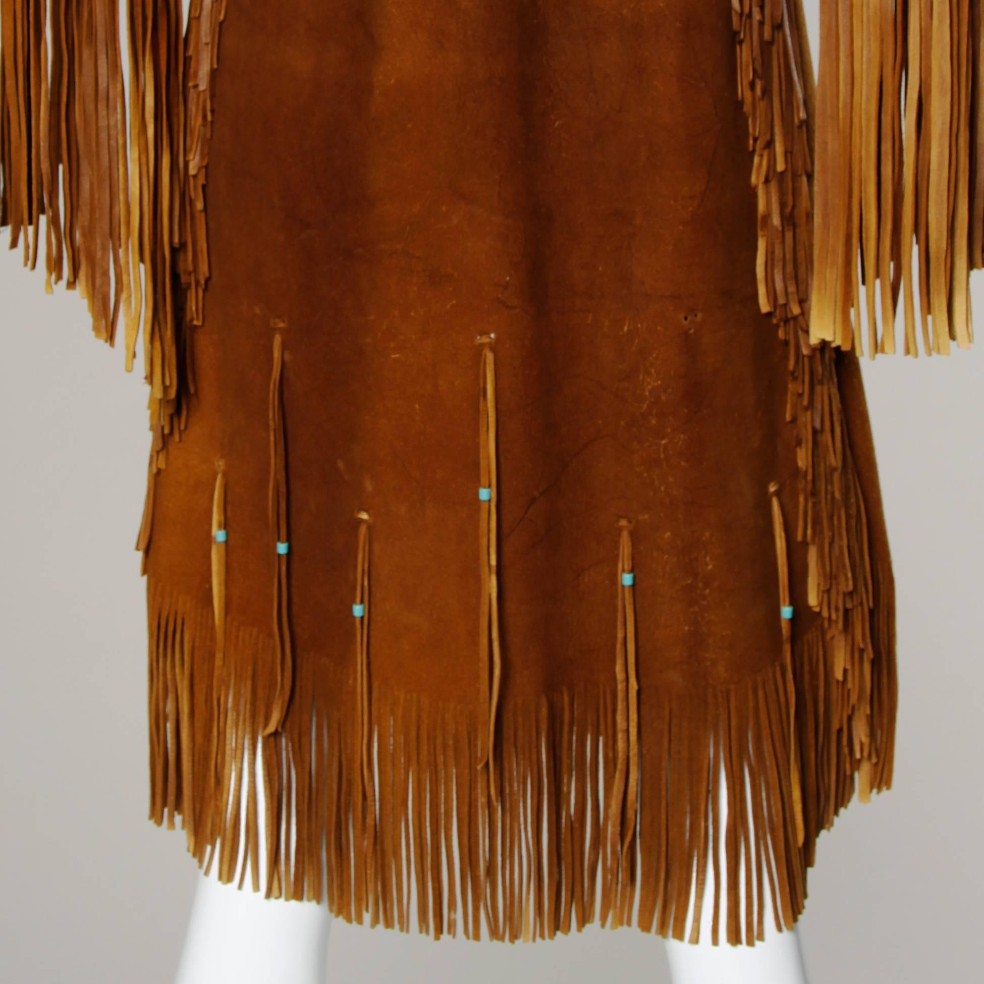 Brown Traditionally Hand-Crafted Vintage Native American Buckskin Fringe Coat For Sale