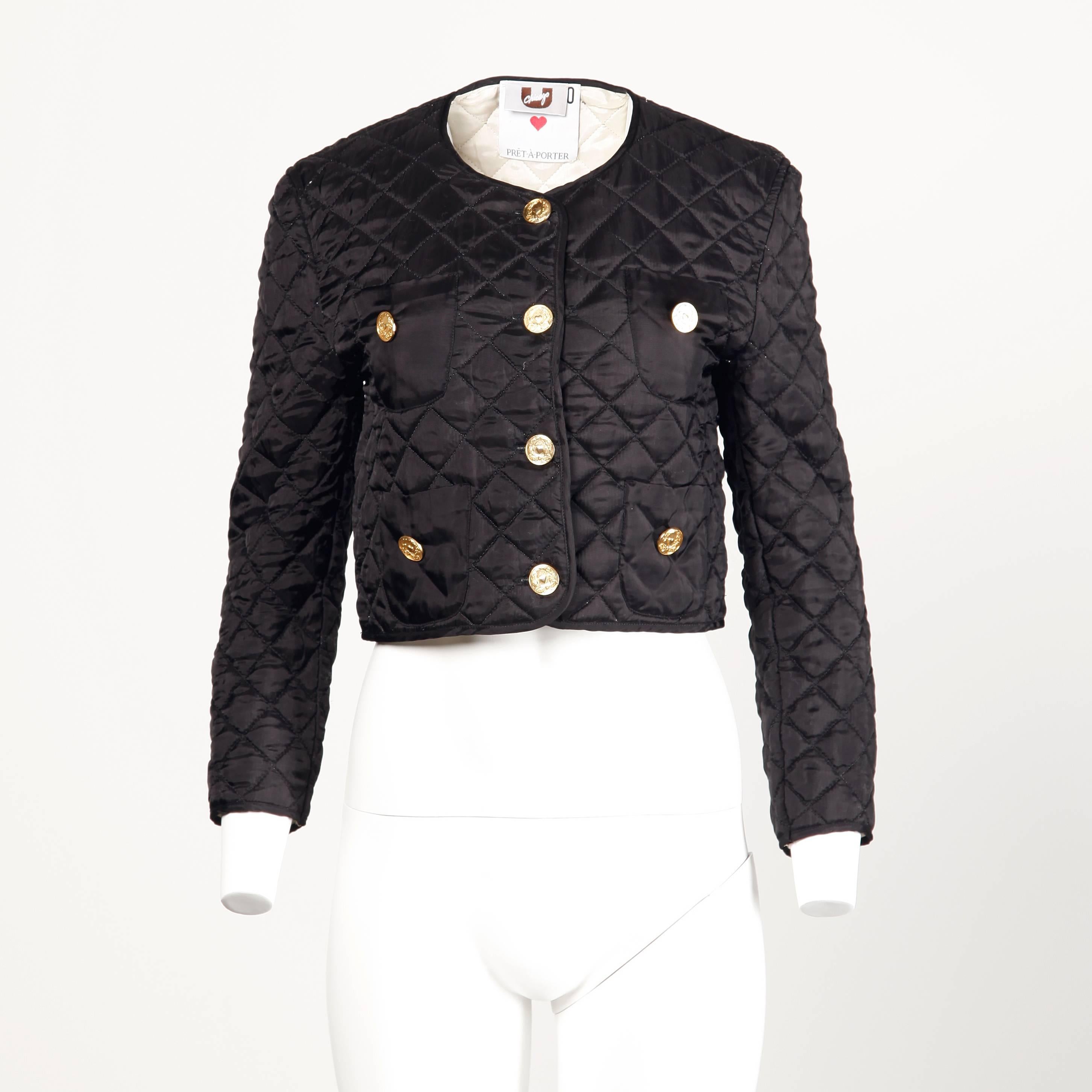 Black quilted Moschino jacket with classic 