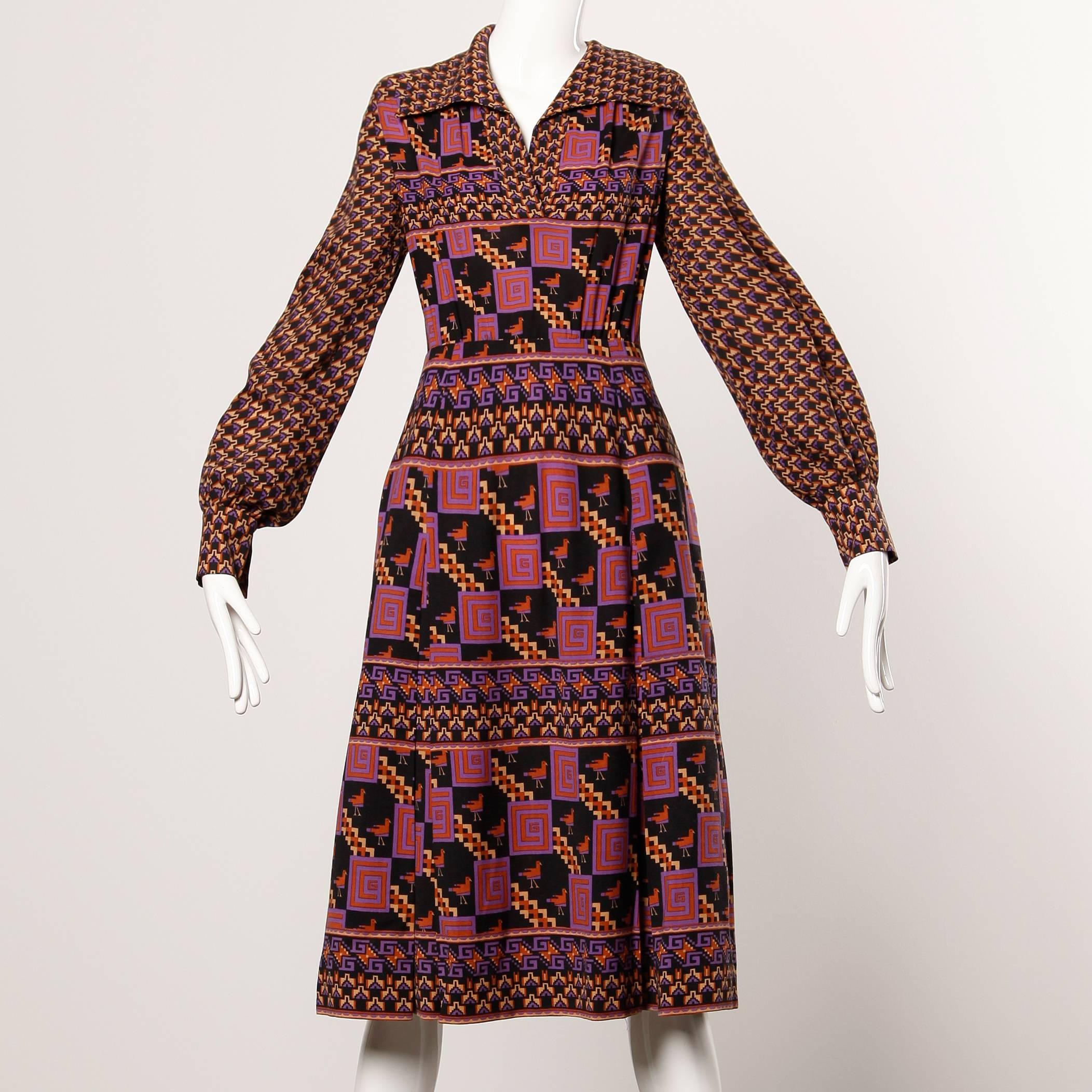 Extremely rare two piece coat and dress ensemble from the 1970s by Gucci. The coat is reversible and can be worn with the printed side out if you remove the label. Utterly fantastic 