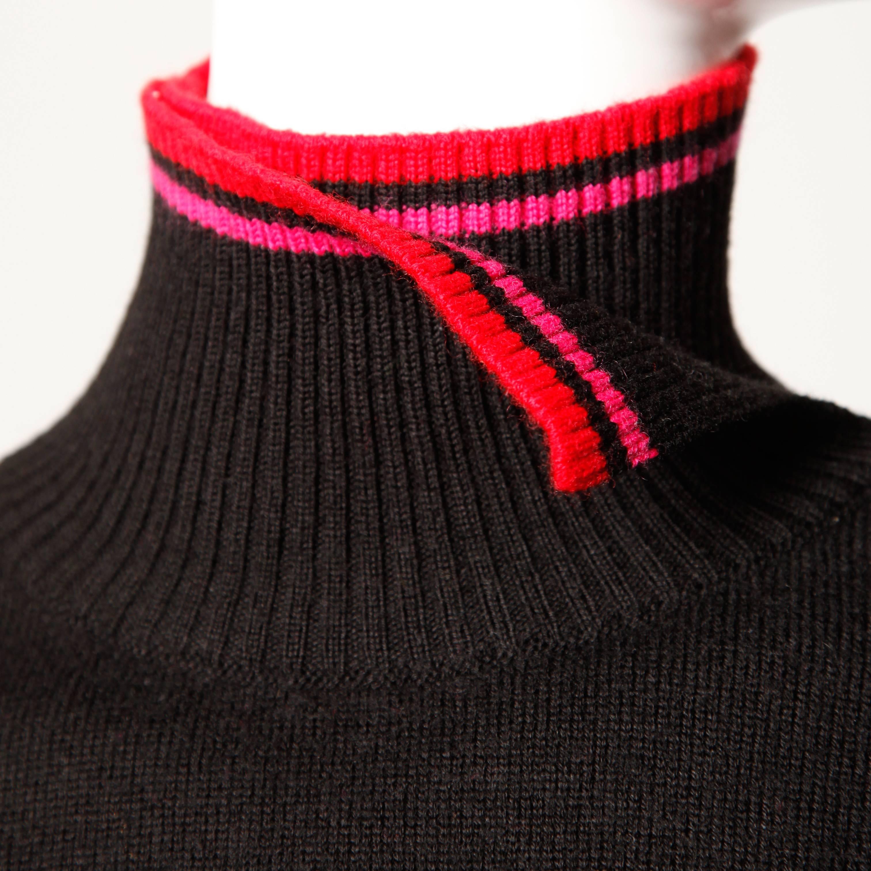 Details: 

Unlined
Estimated Size: Small
Color: Black/ Red and Pink Detail
Fabric: 50% Merino Wool/ 50% Acrylic
Label: Christian Lacroix Bazar

Measurements:

Bust: 36