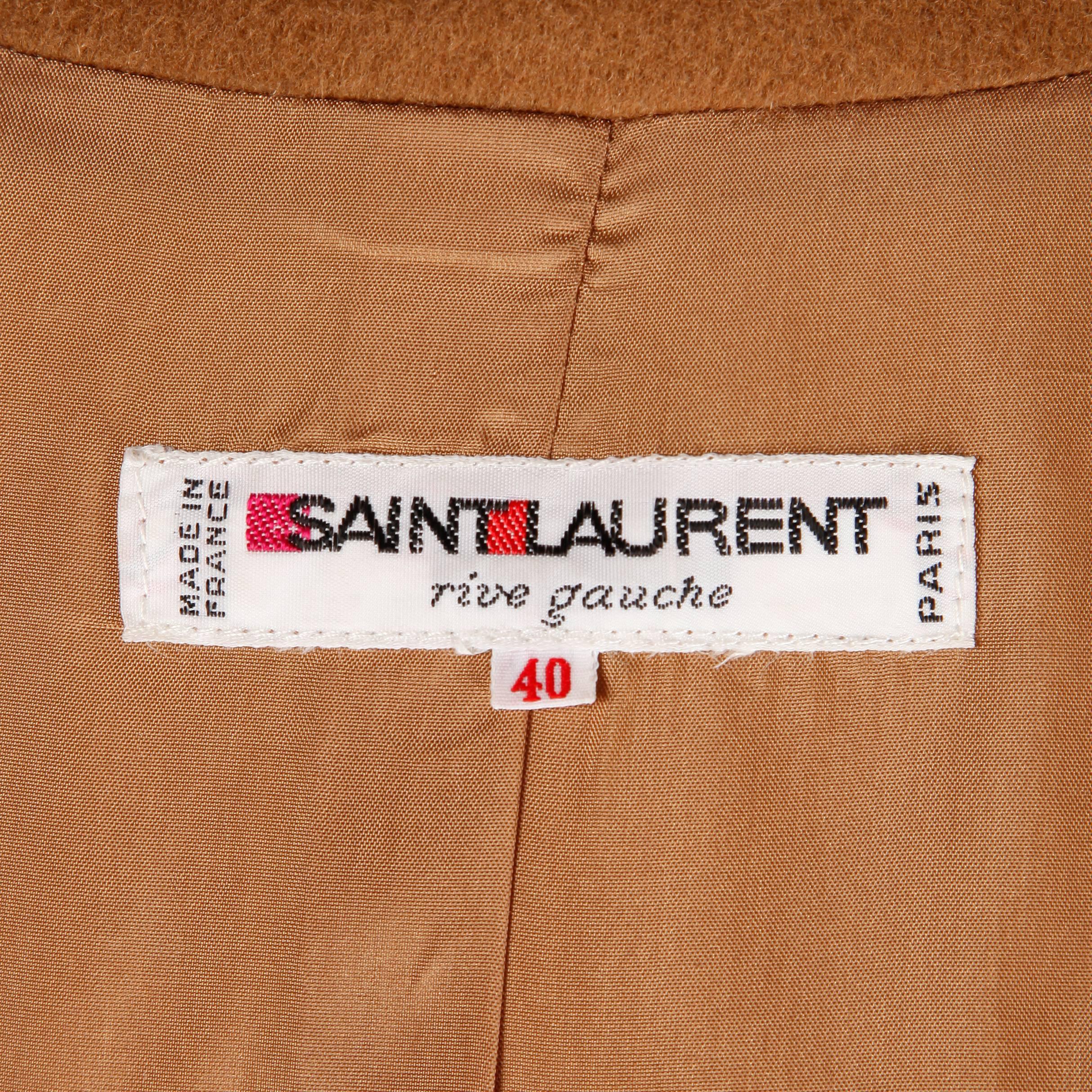 Vintage camel wool blazer jacket by Saint Laurent/ Rive Gauche.

Details: 

Fully Lined
Front Box Pockets
Button Front
Marked Size: 40
Estimated Size: M-L
Color: Camel
Fabric: Wool
Label: Saint Laurent/ Rive Gauche

Measurements: