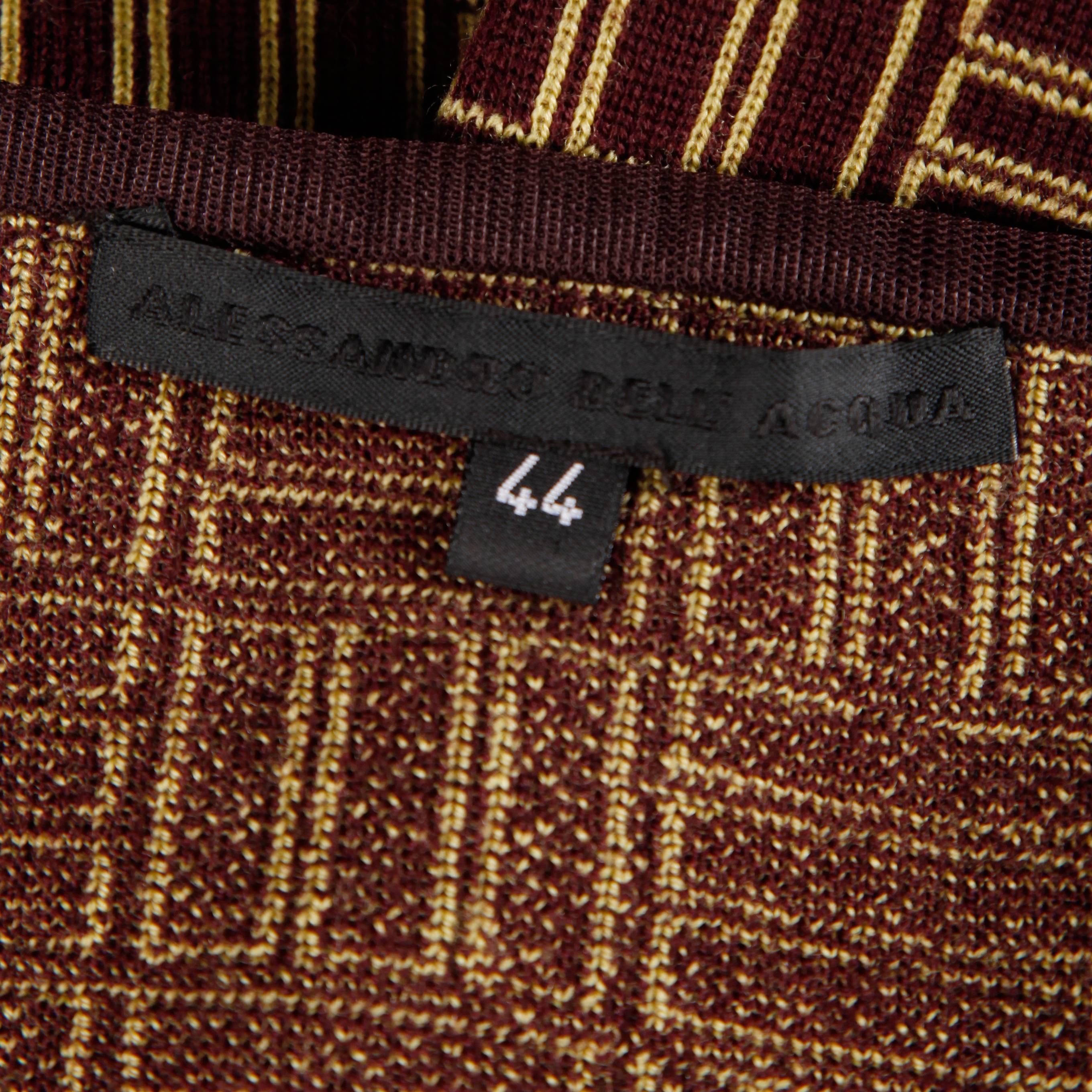 Jupe vintage en tricot géométrique d'Alessandro Dell'Acqua en laine mérinos.

Détails : 

Non doublé
Zip latéral avec fermeture à crochet
Taille marquée : 44
Taille estimée : M-L
Couleur : Marron/ Tan
Tissu : tricot 100% laine