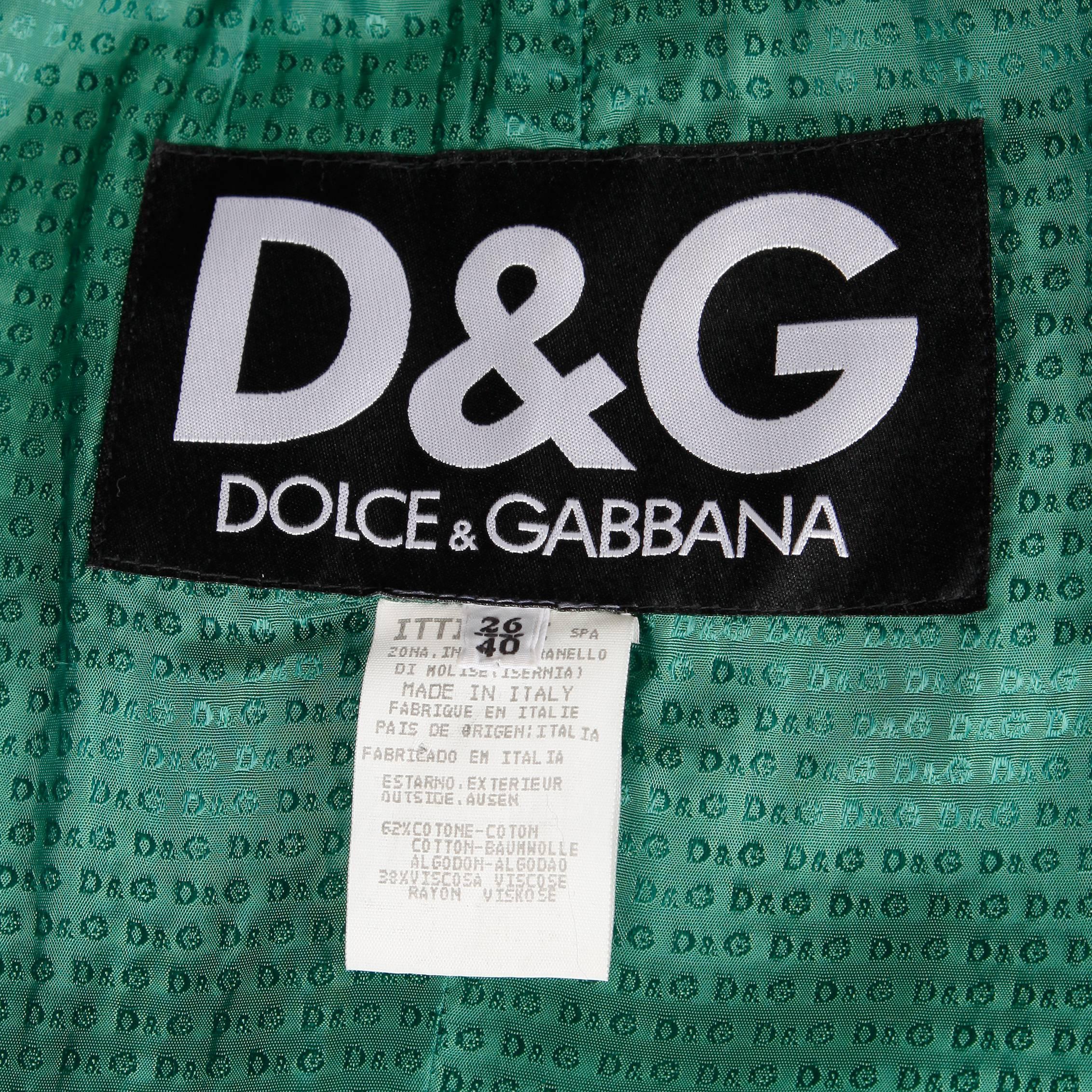 Dolce and Gabbana brown faux fur jacket and skirt ensemble that can be worn together or separately. Bright emerald green lining.

Details:

Fully Lined
Skirt: Side Zip & Button Closure/ Jacket: Button Front
Marked Size: 26/ 40
Estimated Size: