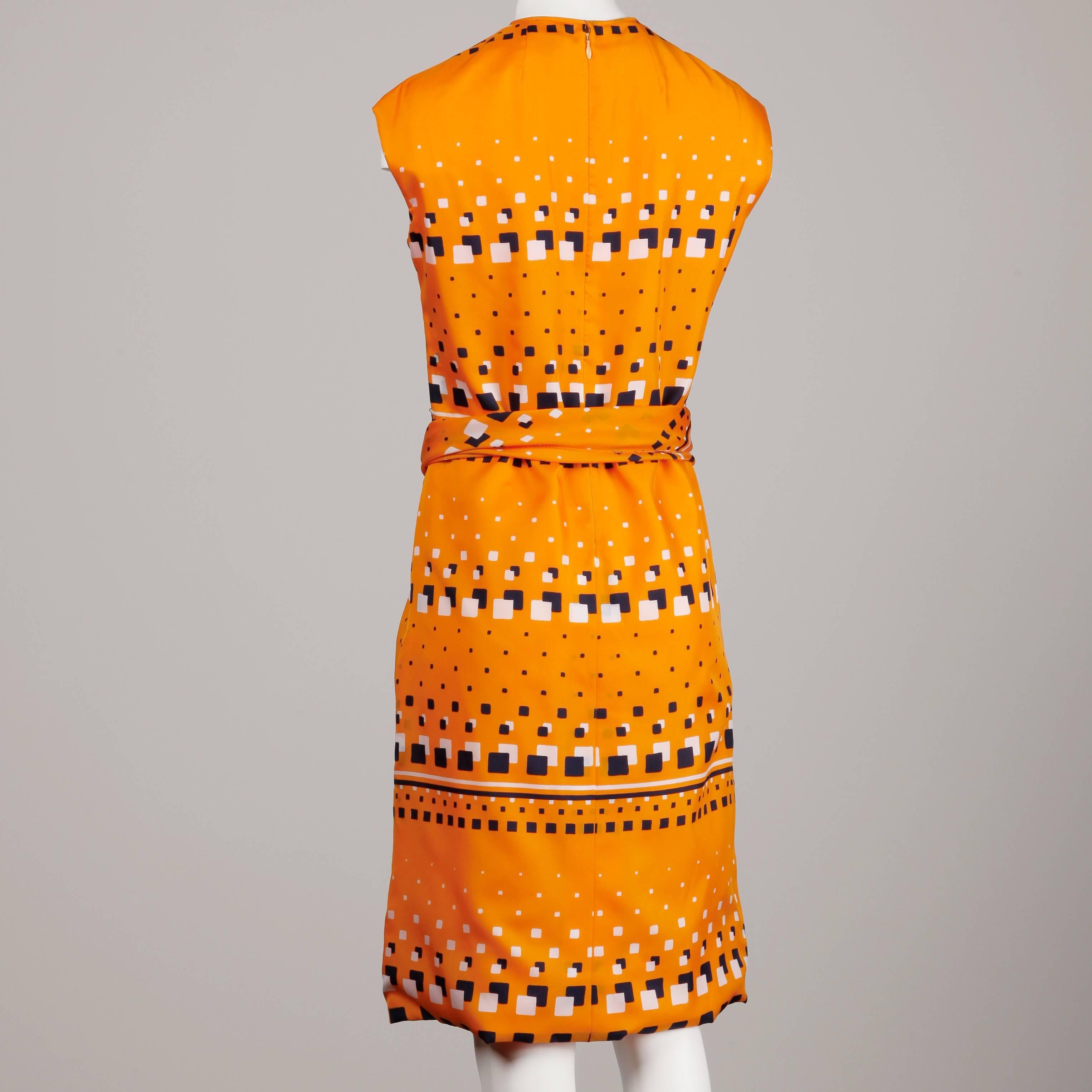 adele orange dress