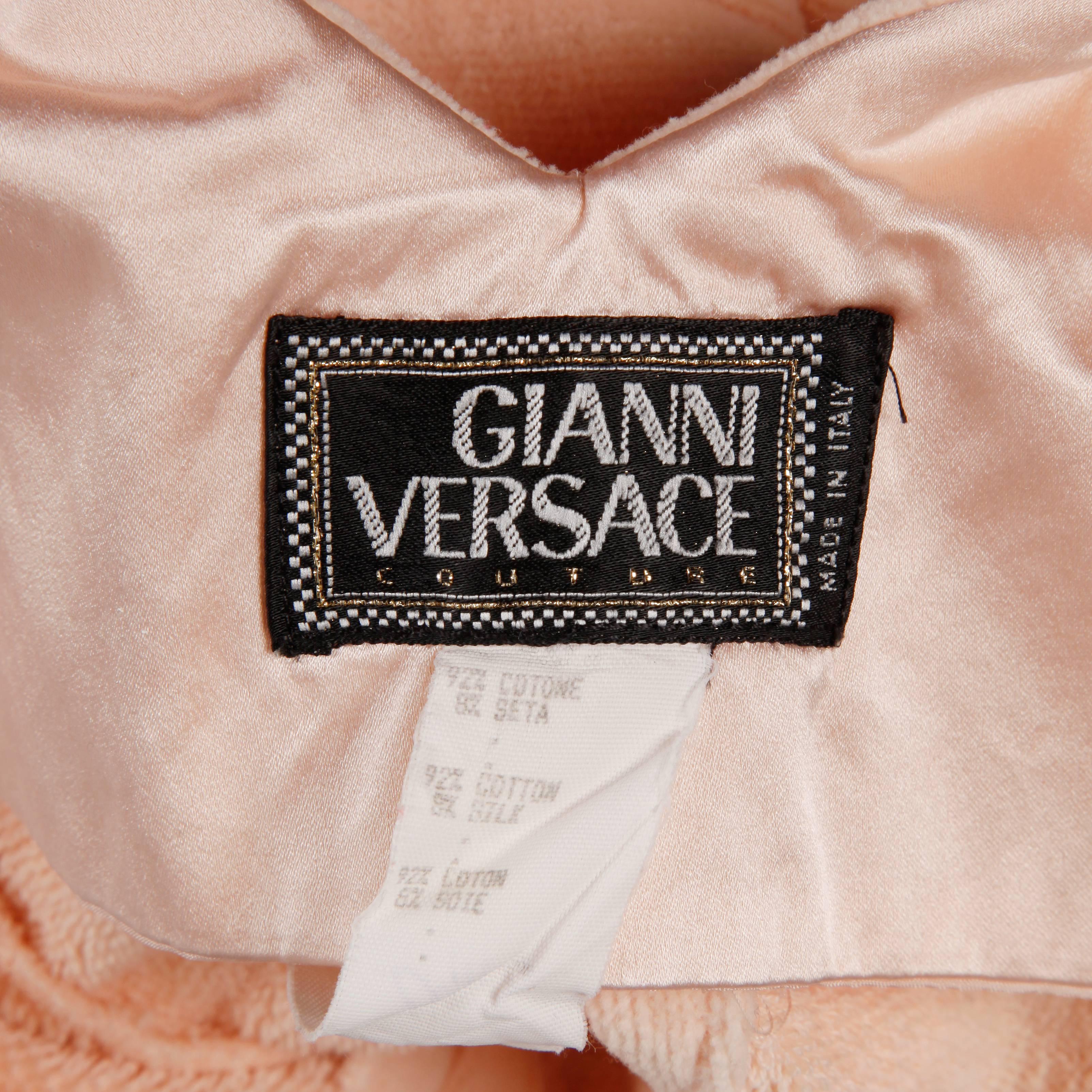 Super soft pale pink body con dress in a velvety chenille by Gianni Versace Couture. The cut on this is so flattering! Simple, elegant and chic.

Details: 

Fully Lined
Size Zip and Hook Closure
Marked Size: 6
Estimated Size: Small
Color:
