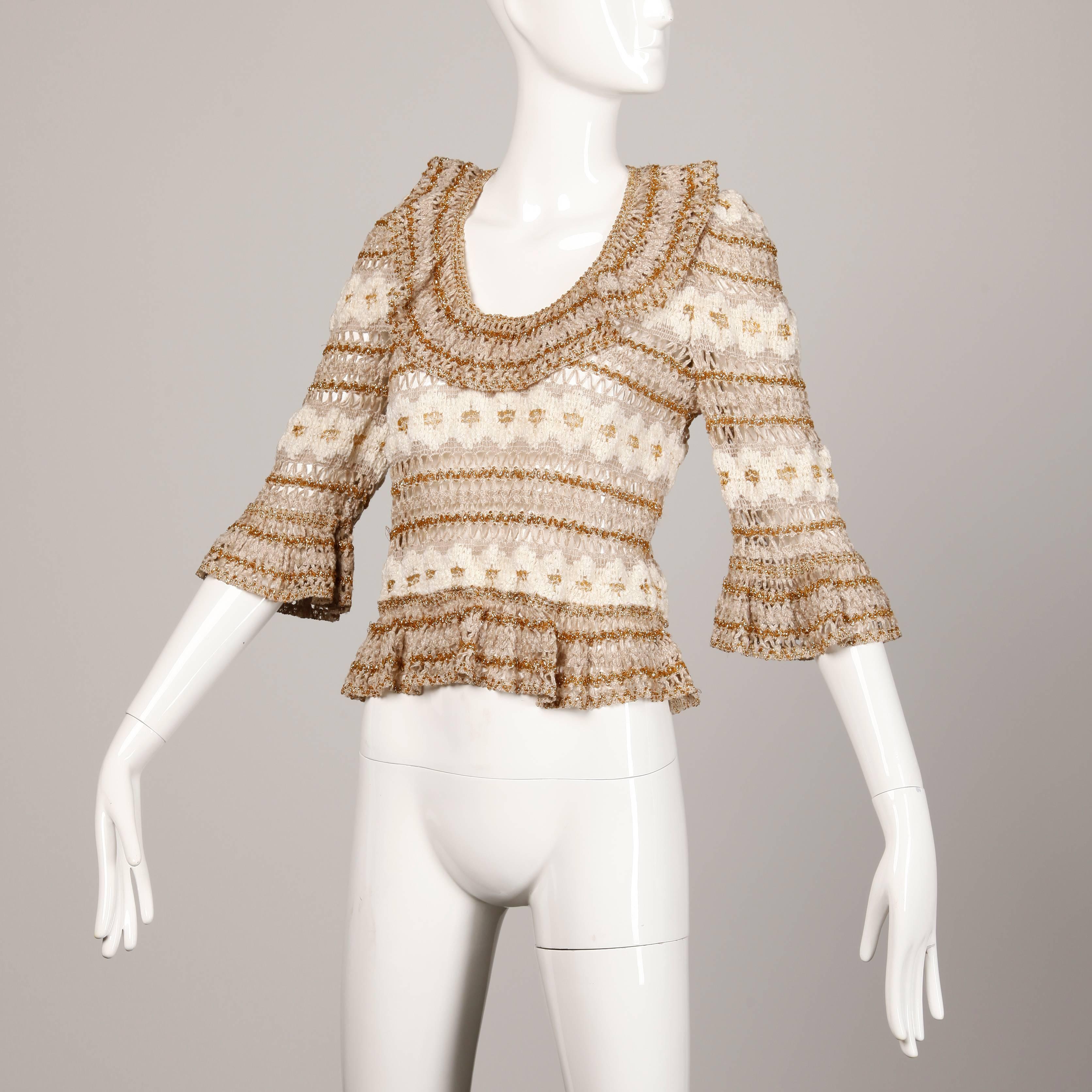 Amazing vintage metallic sweater top by Lillie Rubin. Bell sleeves and ruffled scoop neck.

Details: 

Unlined
Marked Size: 12
Estimated Size: Medium
Color: Tan/ Beige/ Gold
Fabric: 36% Acrylic/ 15% Polyester/ 10% Rayon Knit
Label: Lillie