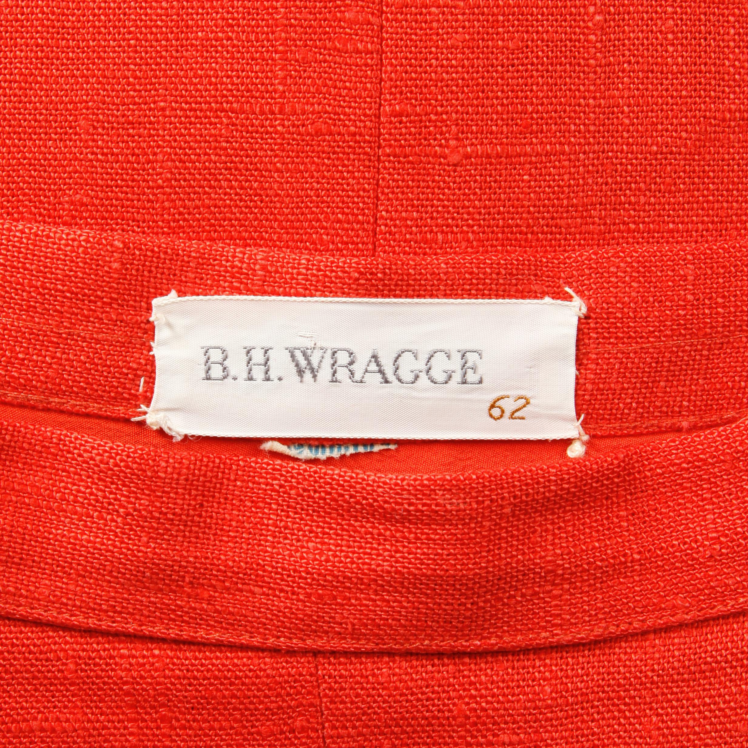 Chic 1960s vintage B.H. Wragge high waisted red pencil skirt in a woven linen. Partially lined with side zip and hook closure. Hidden side pockets. Fits like a modern size small. The waist measures 26