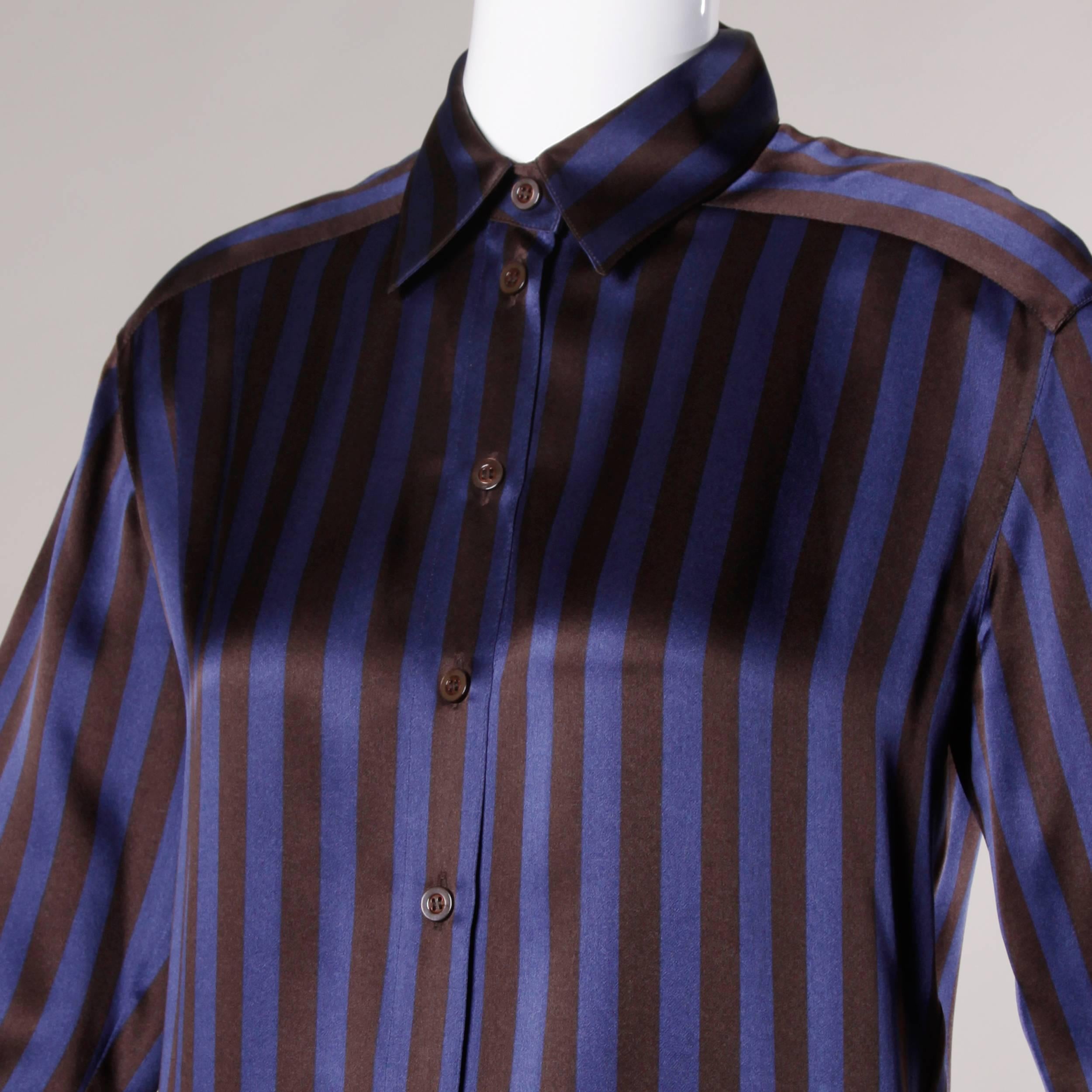 Brown and blue striped silk button up blouse by Margaretha Ley for Escada.

Details:

Unlined
Shoulder Pads Can Easily Be Removed If Desired
Front Button and Wrist Button Closure
Marked Size: 34
Estimated Size: Medium
Color: Royal Blue/